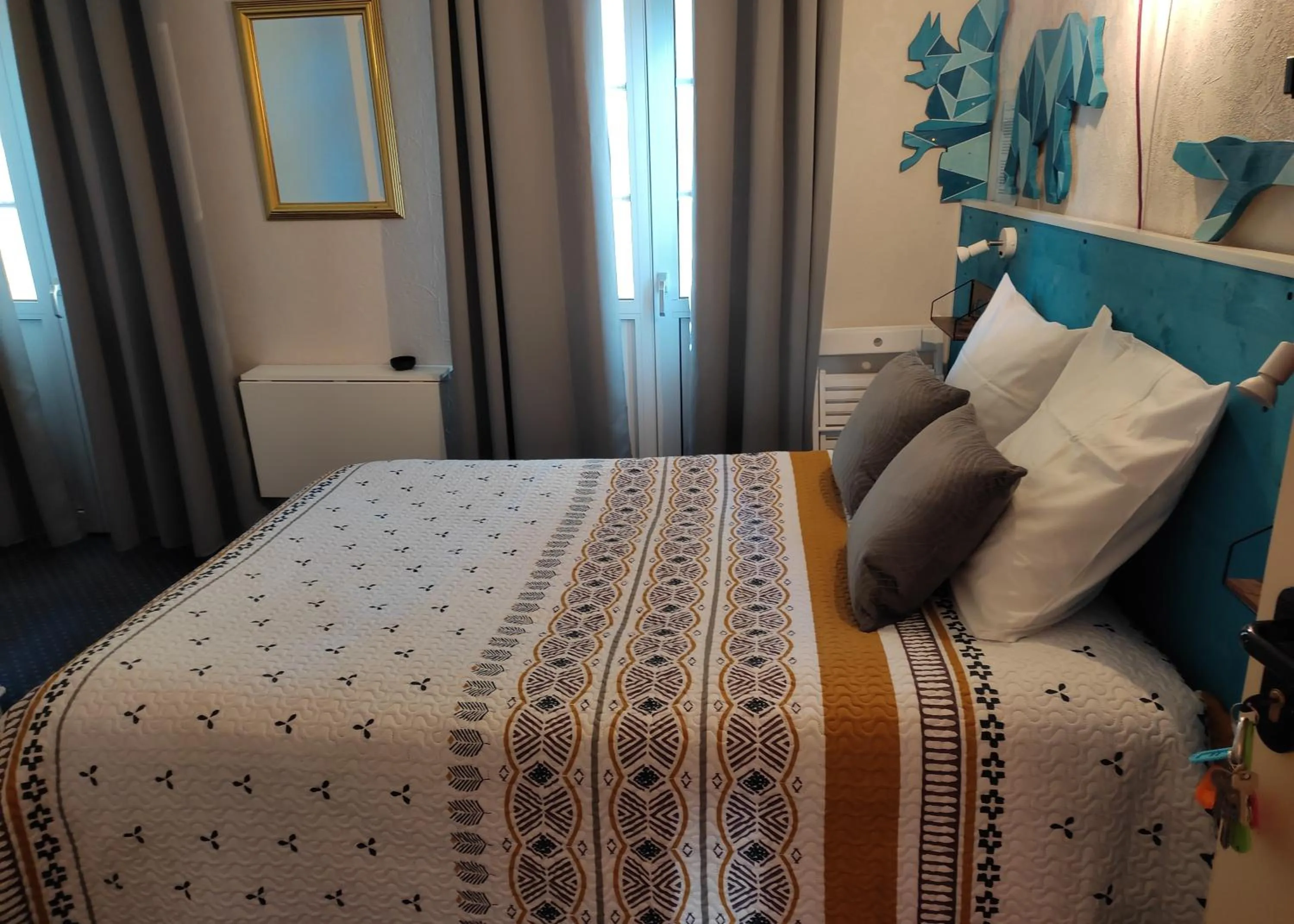 Bed in Hôtel Confort 09 ou HC-09