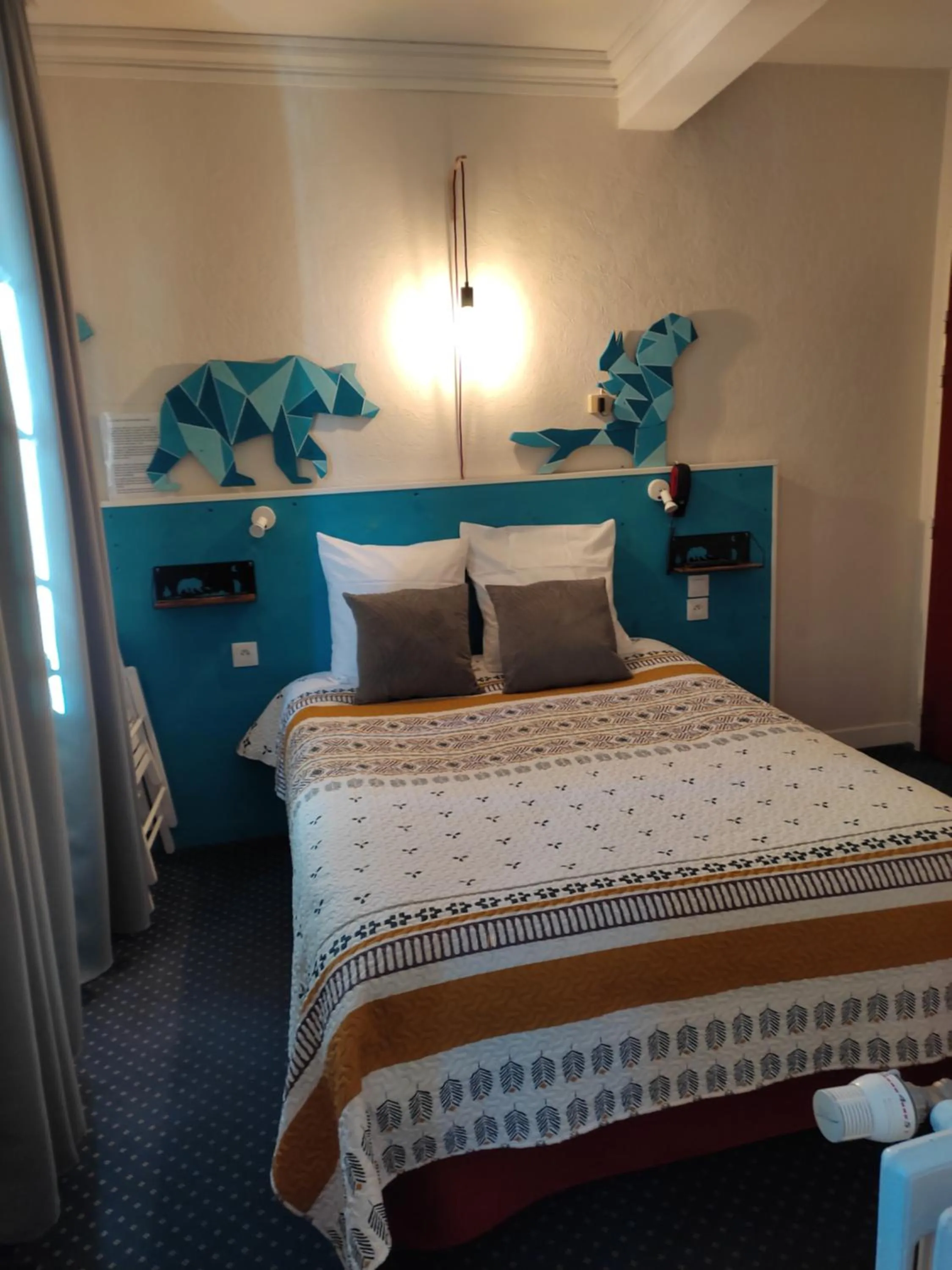 Bed in Hôtel Confort 09 ou HC-09