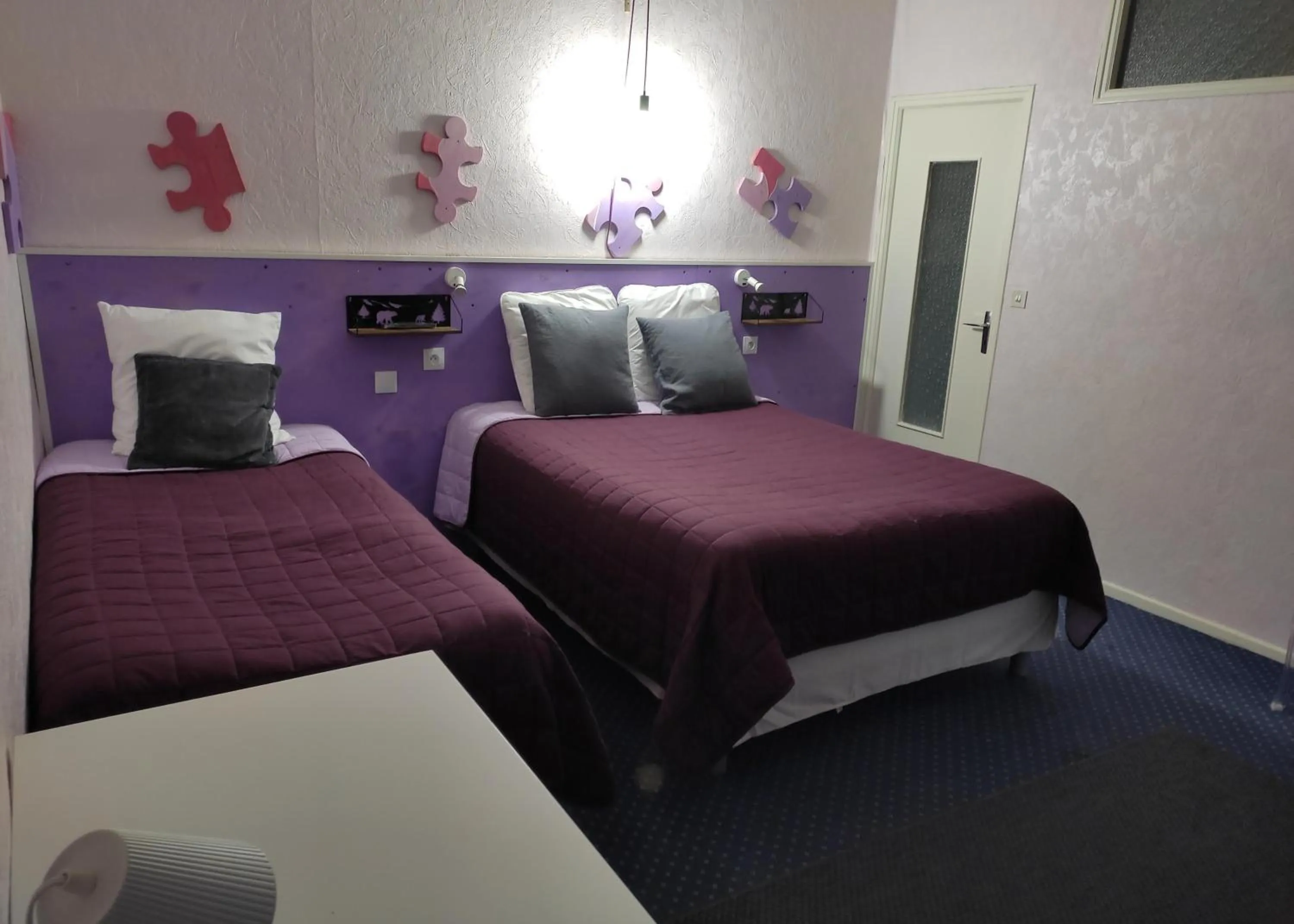 Bed in Hôtel Confort 09 ou HC-09