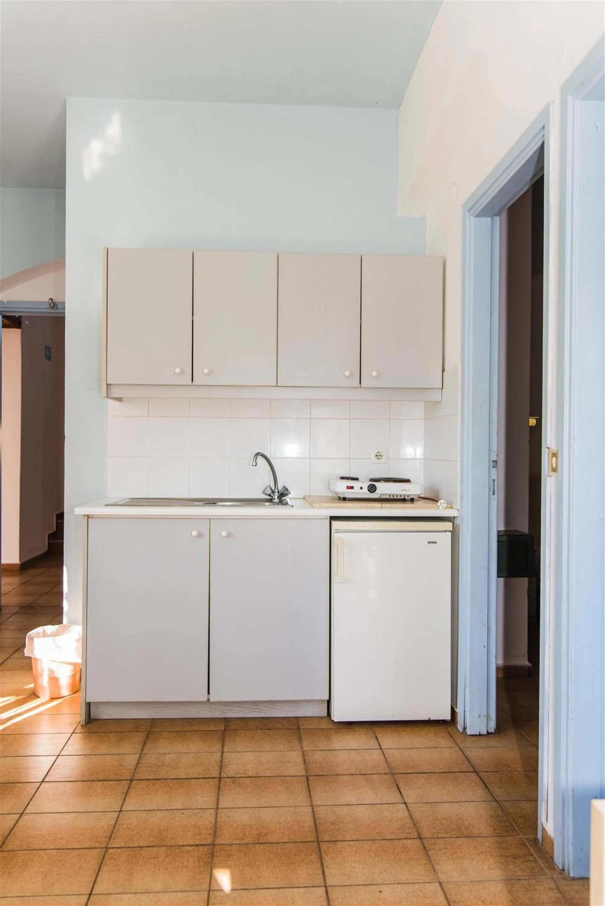 Kitchen or kitchenette in Minoa Hotel