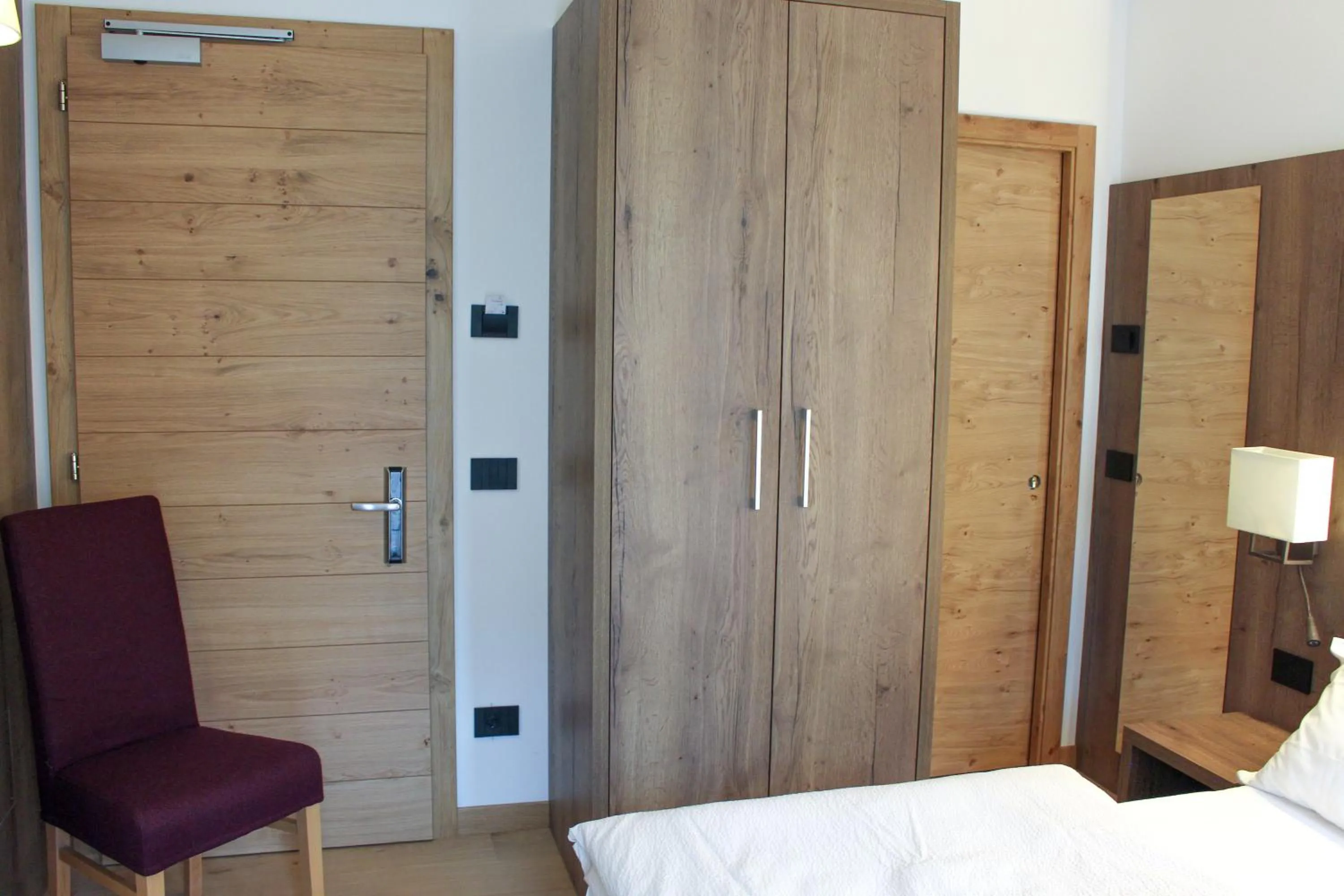 Communal lounge/ TV room, Bed in Edelweiss Alpine Nature