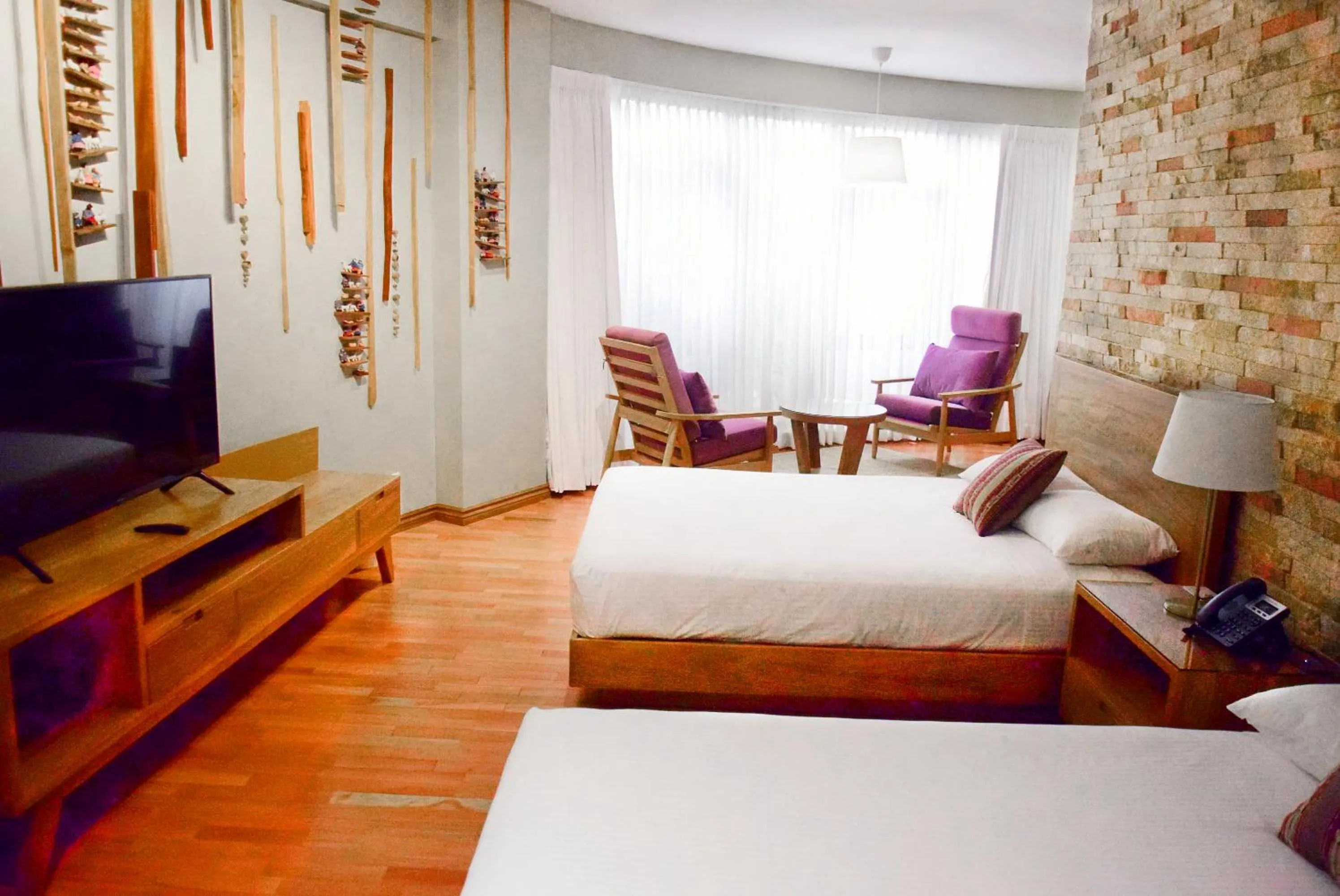 Living room, Bed in Hotel Boutique Rosario Sur