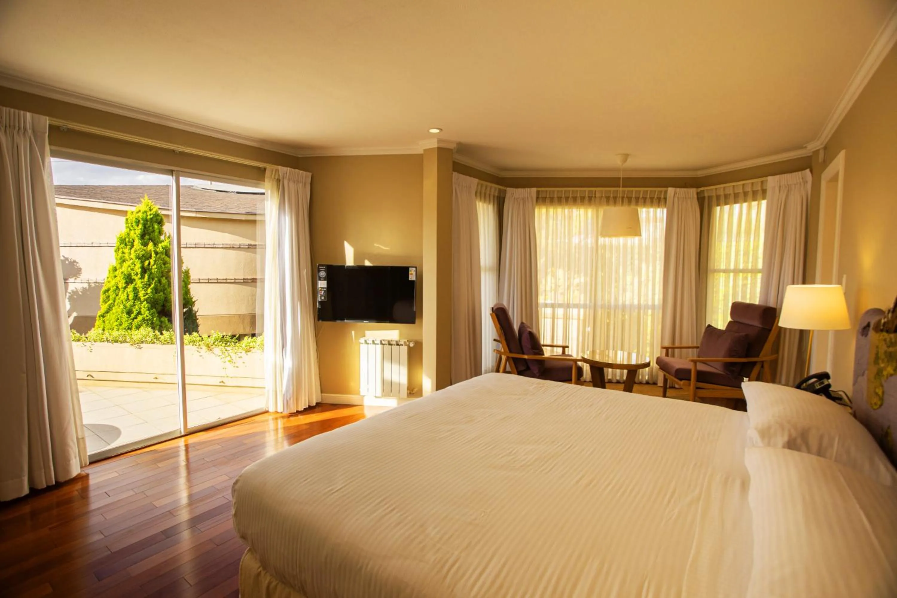 Living room, Bed in Hotel Boutique Rosario Sur