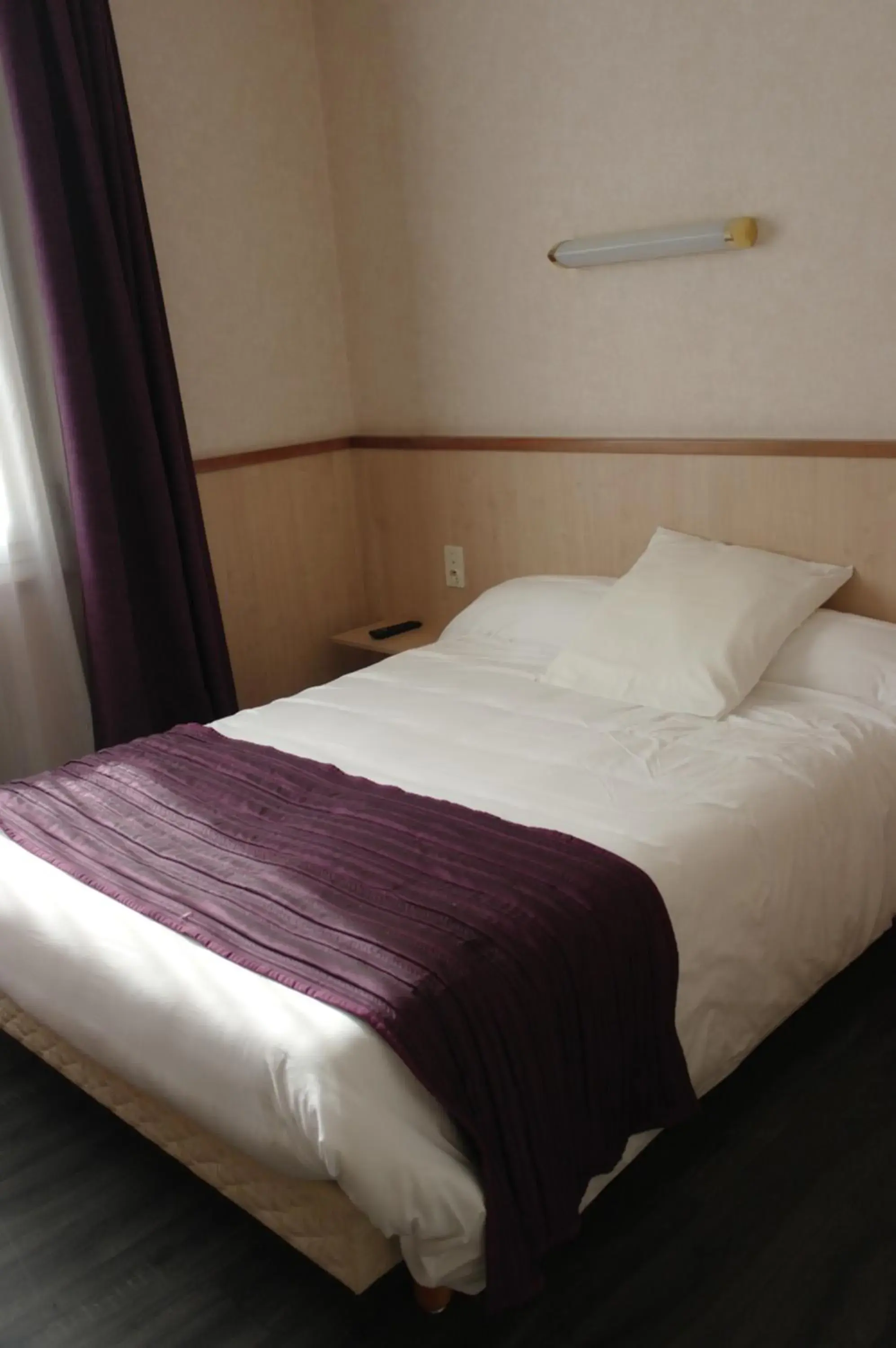 Bed in Hôtel Le Palous Bed in Hôtel Le Palous