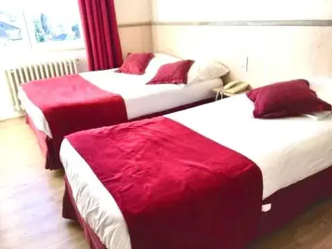 Bedroom, Bed in Logis Hôtel Restaurant Le Palous Bedroom, Bed in Logis Hôtel Restaurant Le Palous