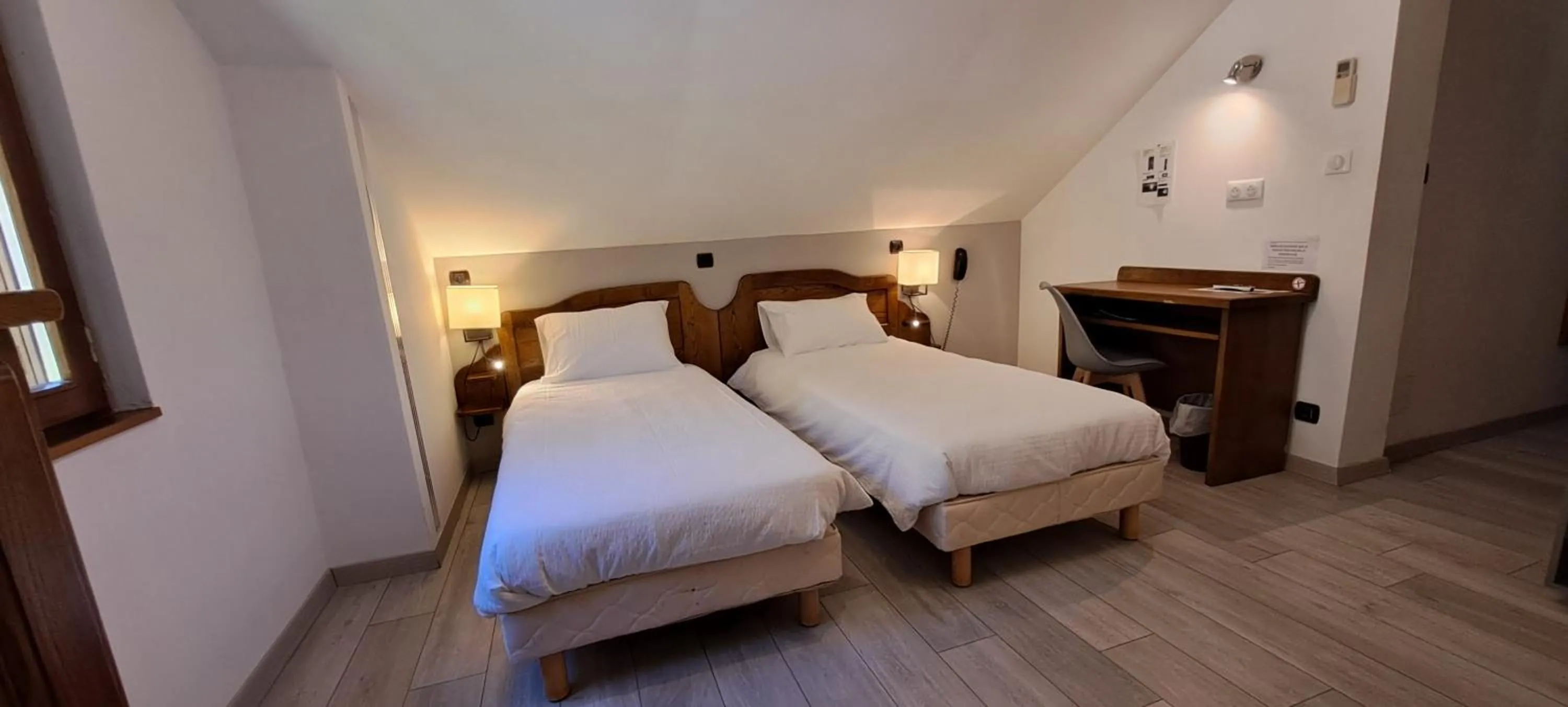 Bedroom, Bed in Logis Hôtel restaurant Auberge de la Cascade