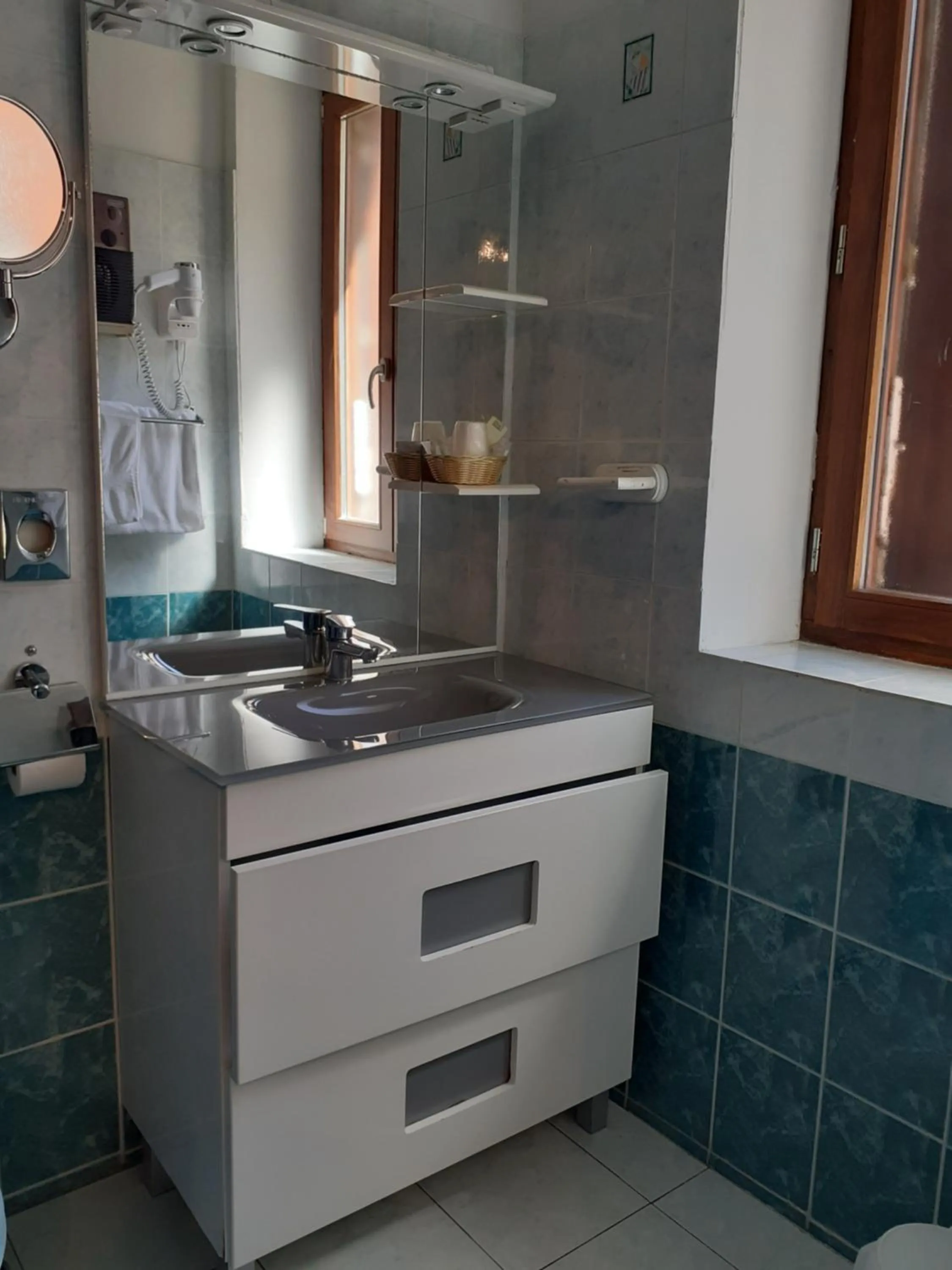 Bathroom in Logis Hôtel restaurant Auberge de la Cascade
