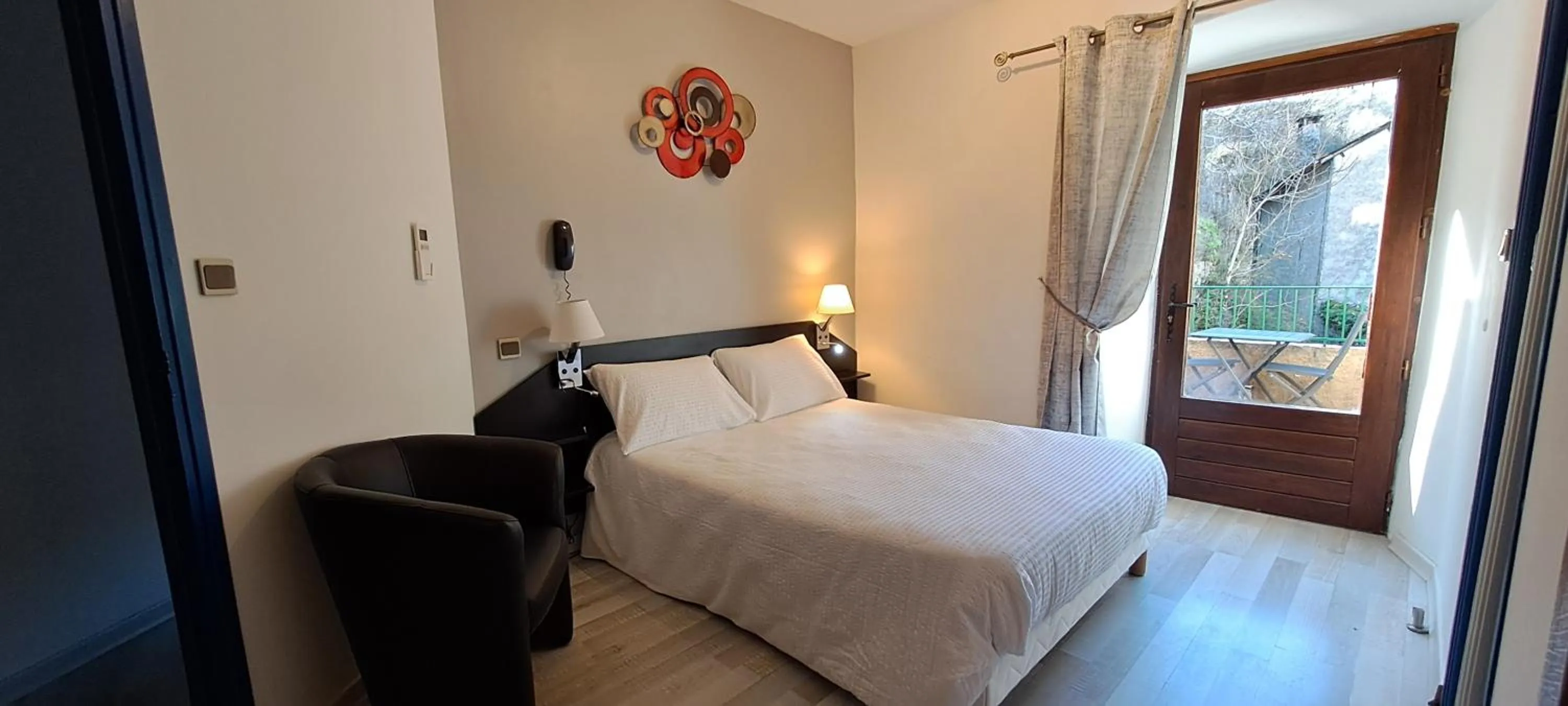 Bedroom, Bed in Logis Hôtel restaurant Auberge de la Cascade