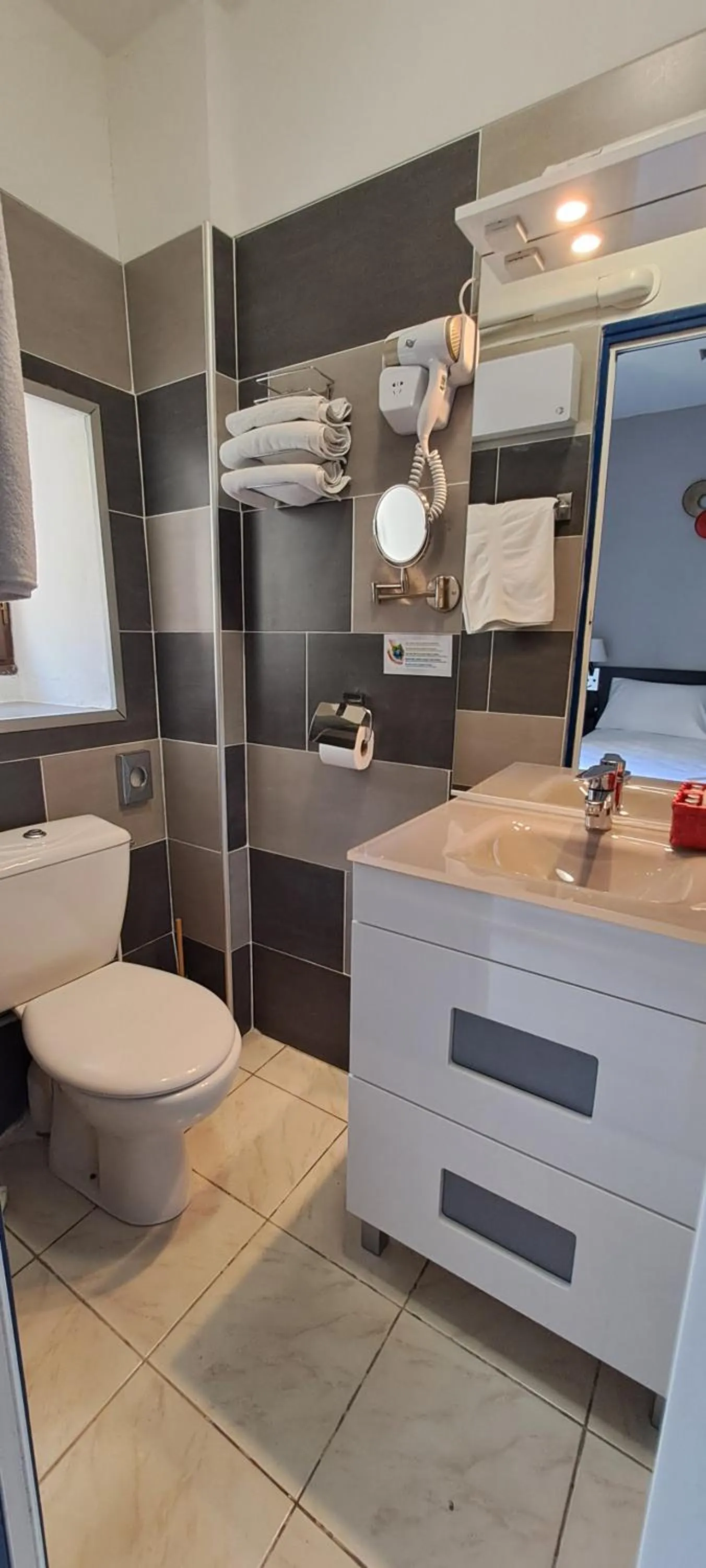 Bathroom in Logis Hôtel restaurant Auberge de la Cascade