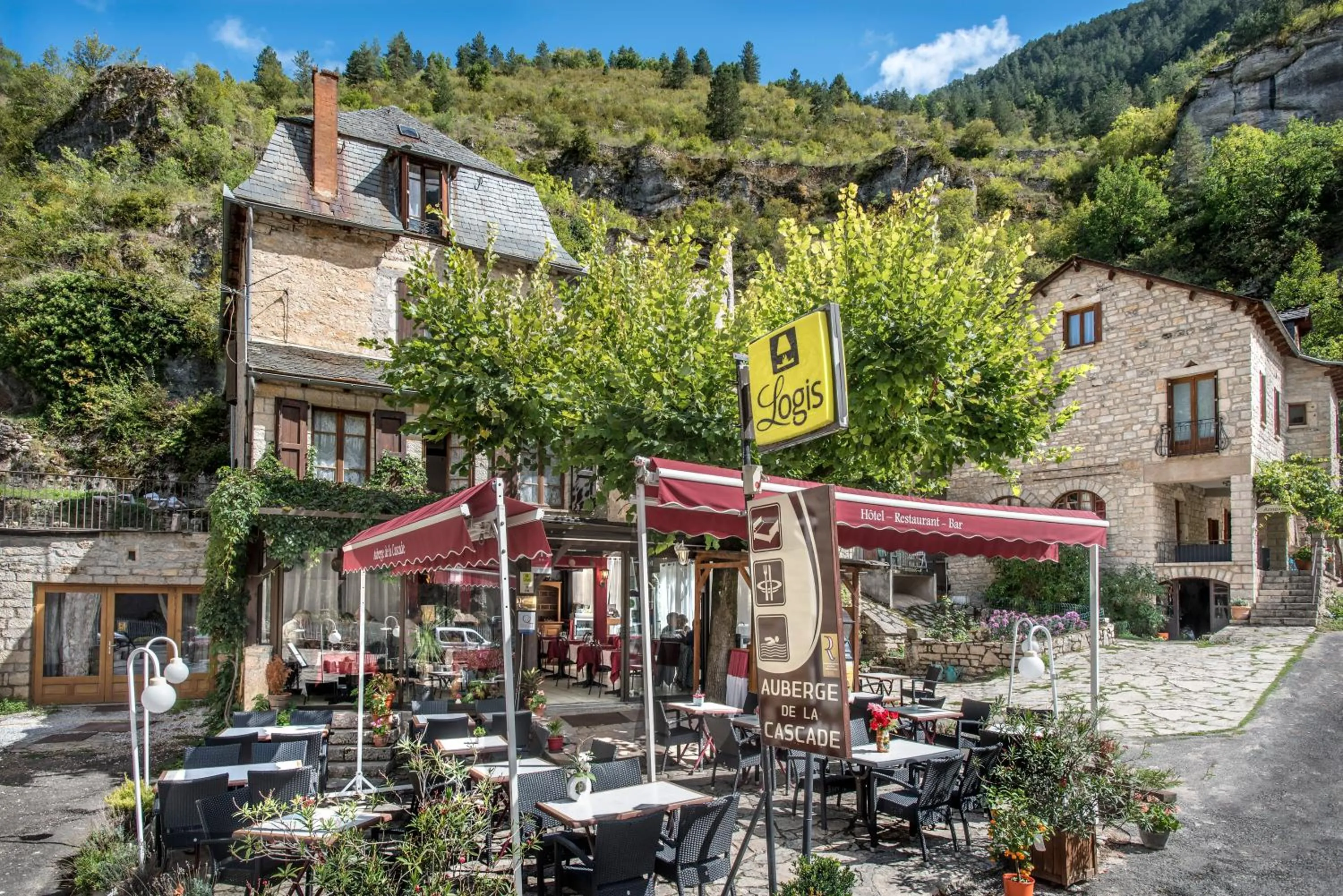 Facade/entrance in Logis Hôtel restaurant Auberge de la Cascade