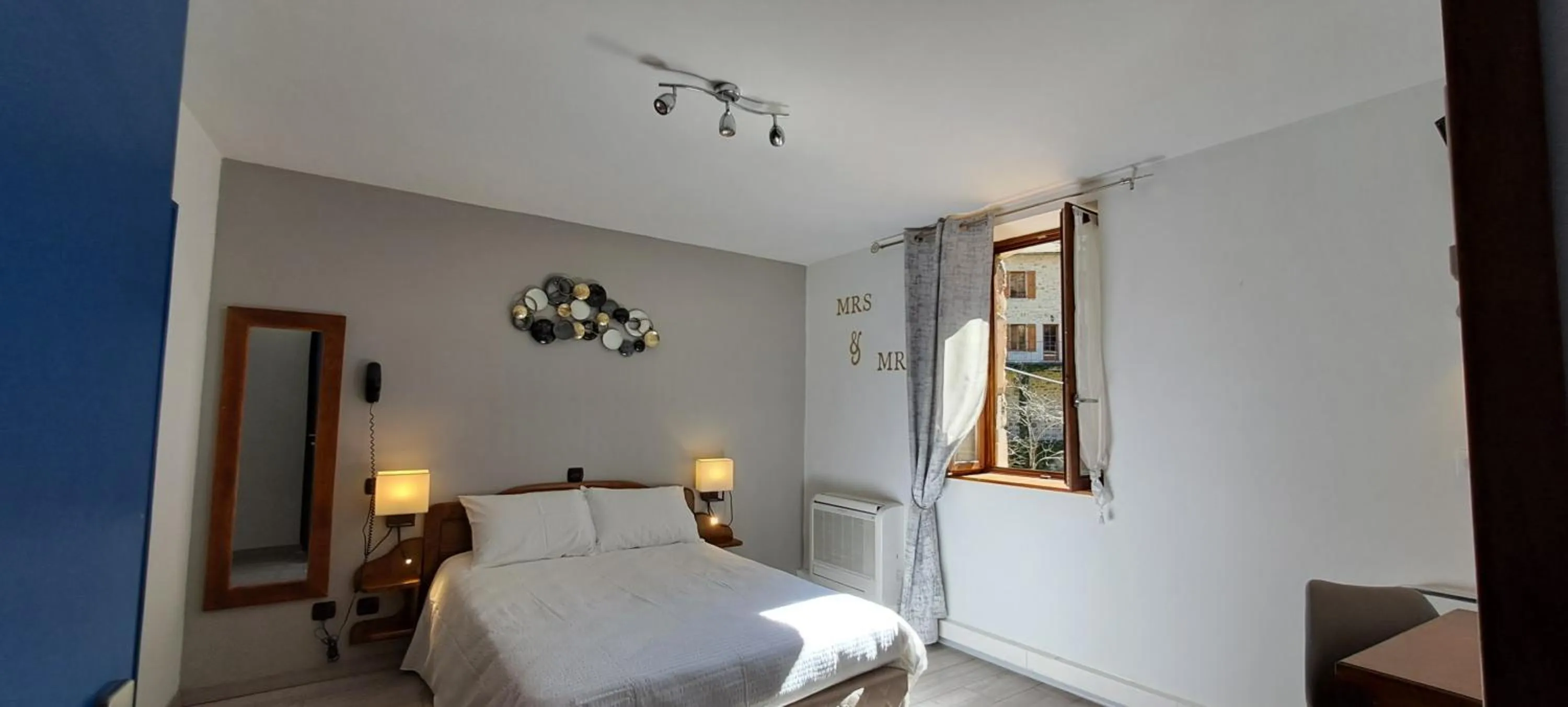 Bedroom, Bed in Logis Hôtel restaurant Auberge de la Cascade