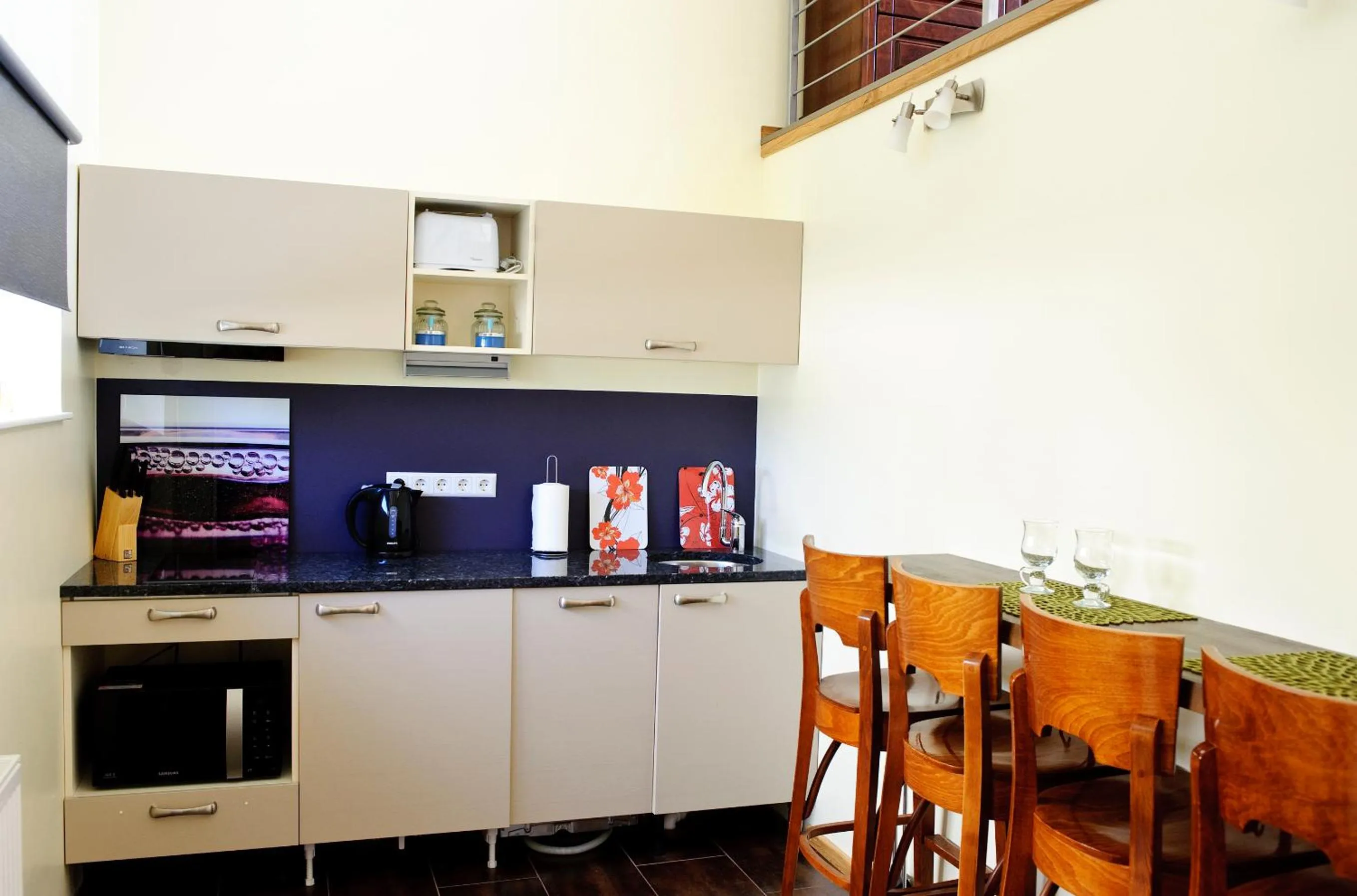 Kitchen or kitchenette in Embrace Hotel & Apartments