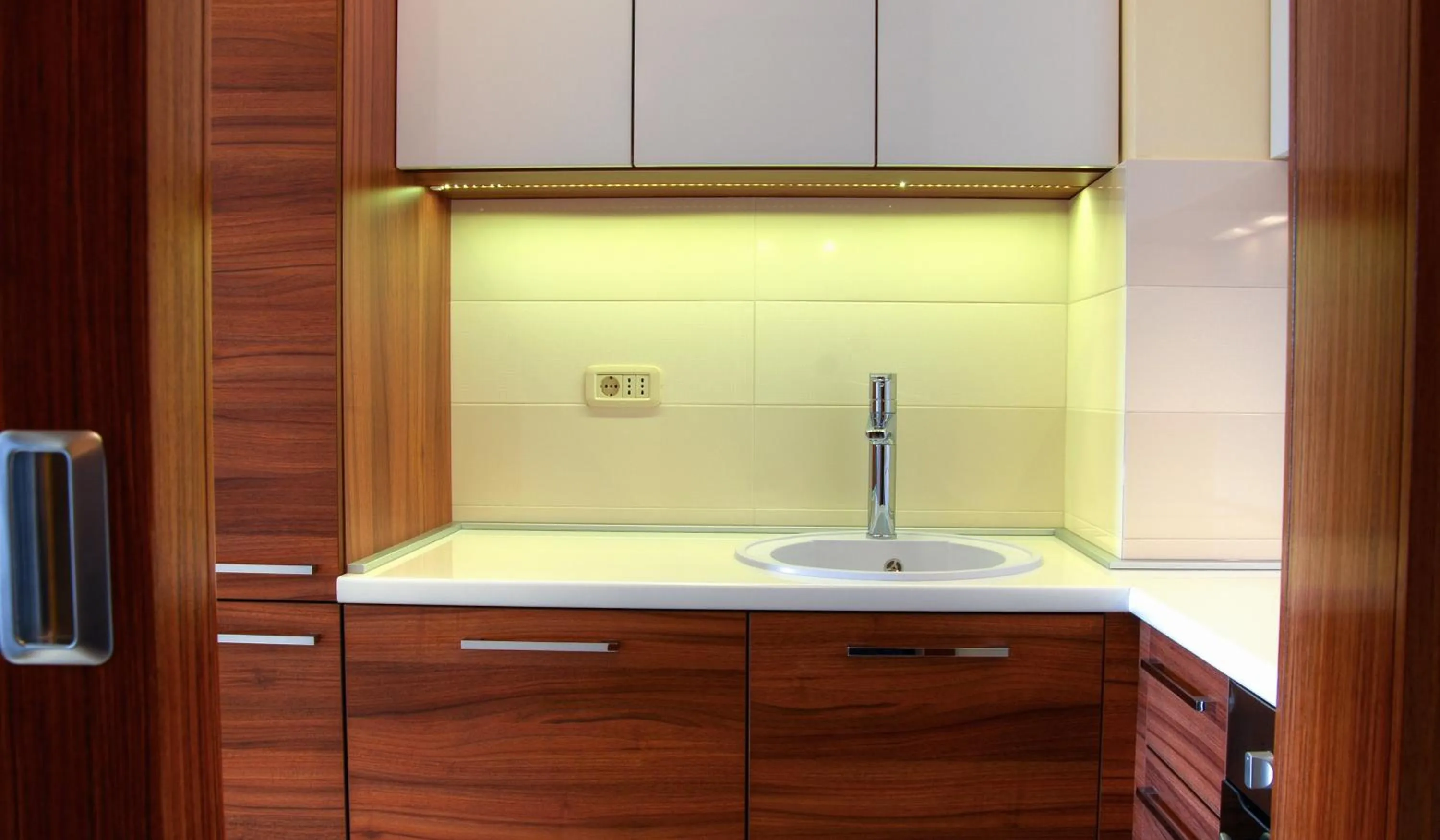 Kitchen or kitchenette in Apartments Athos