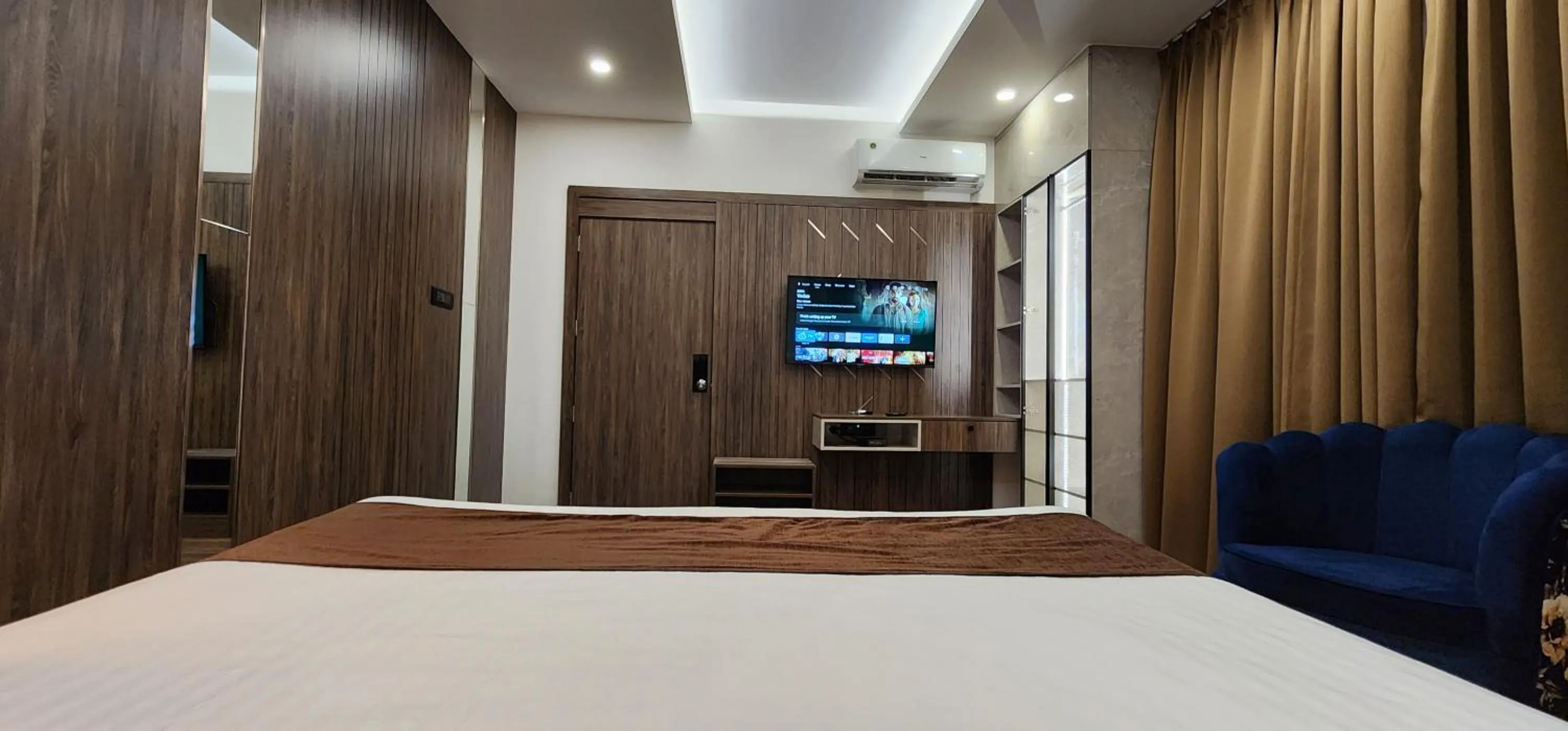 Living room, Bed in Hotel Arcadia