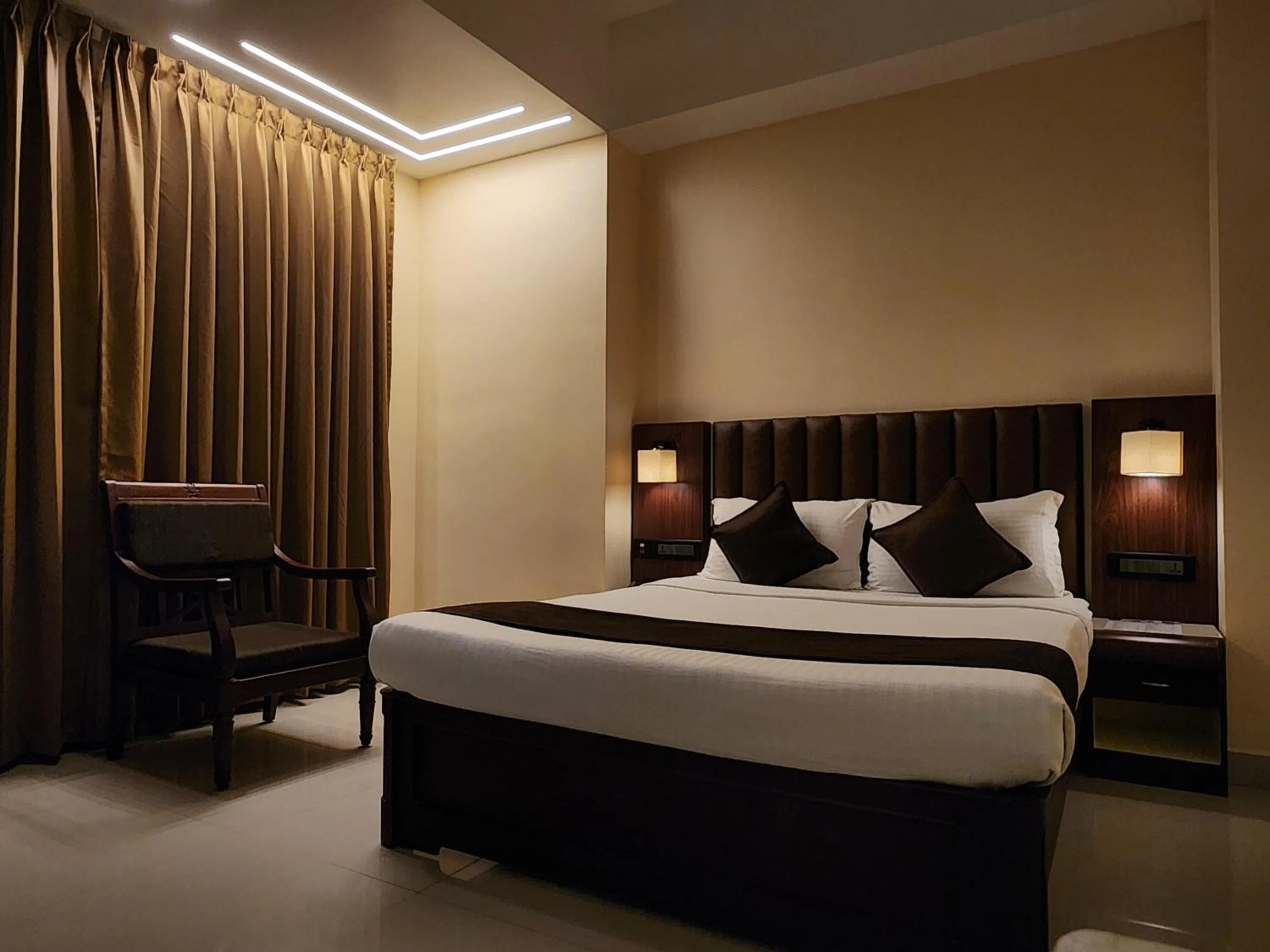 Living room, Bed in Hotel Arcadia