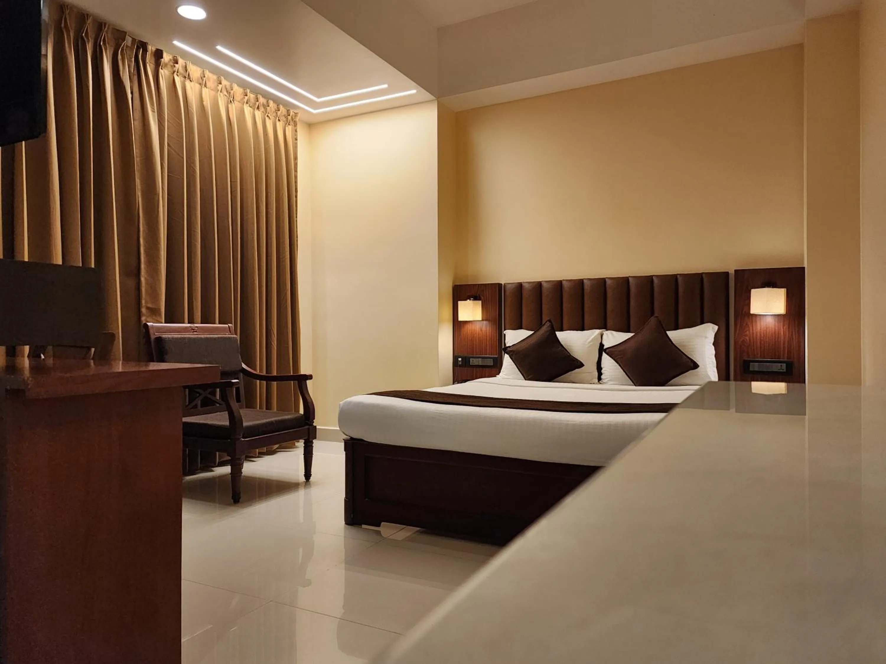 Living room, Bed in Hotel Arcadia