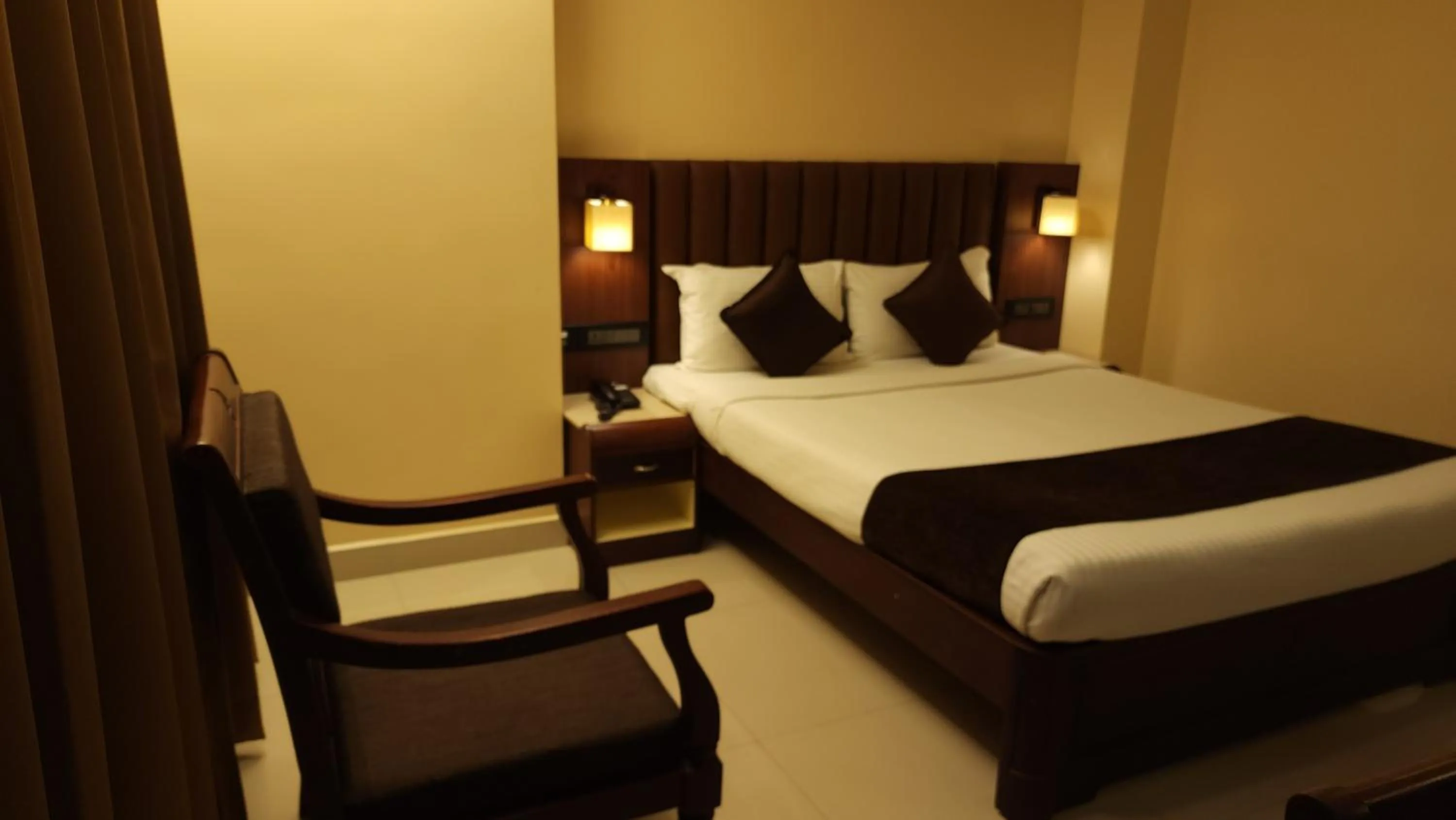 Living room, Bed in Hotel Arcadia