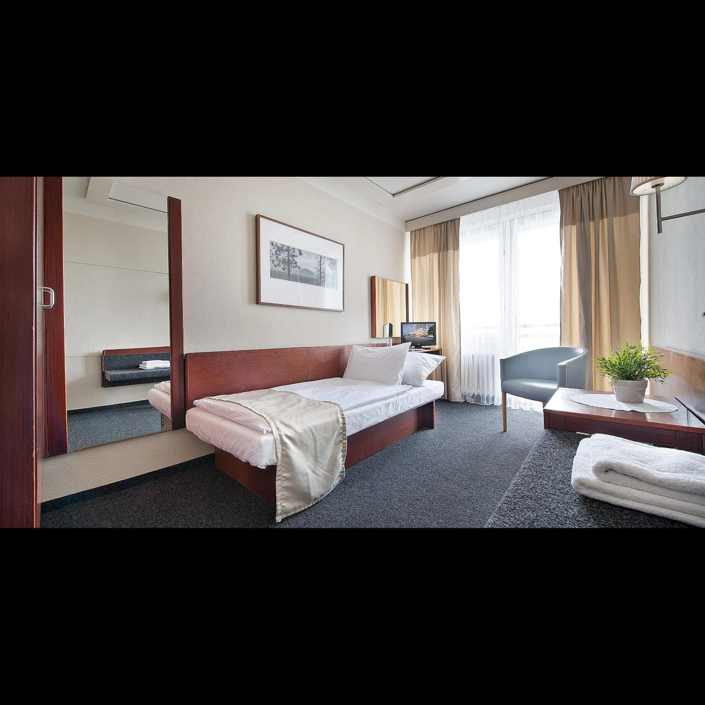 Photo of the whole room, Bed in Hotel Kladno