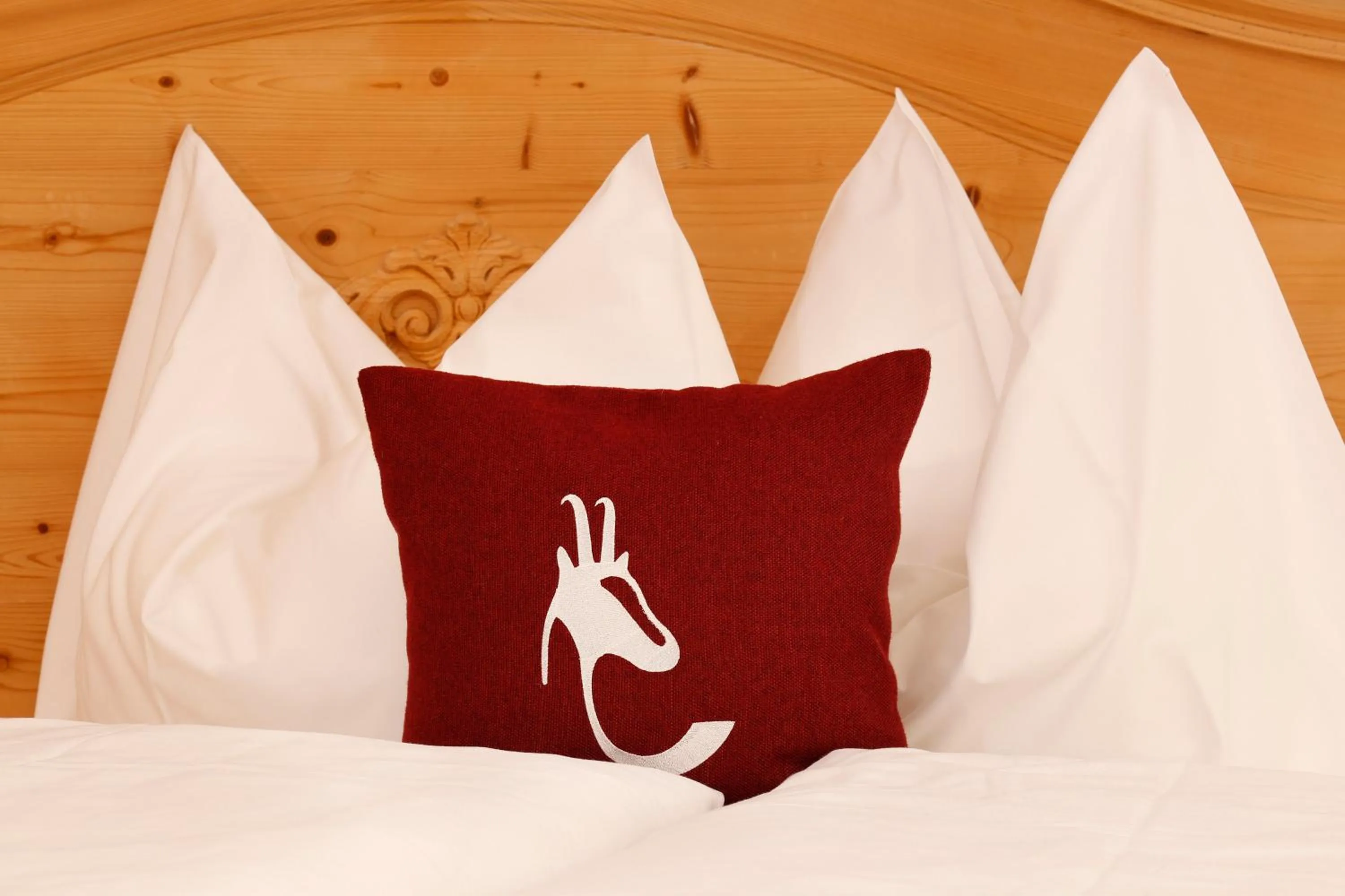 Decorative detail, Bed in Hotel Hubertusstube