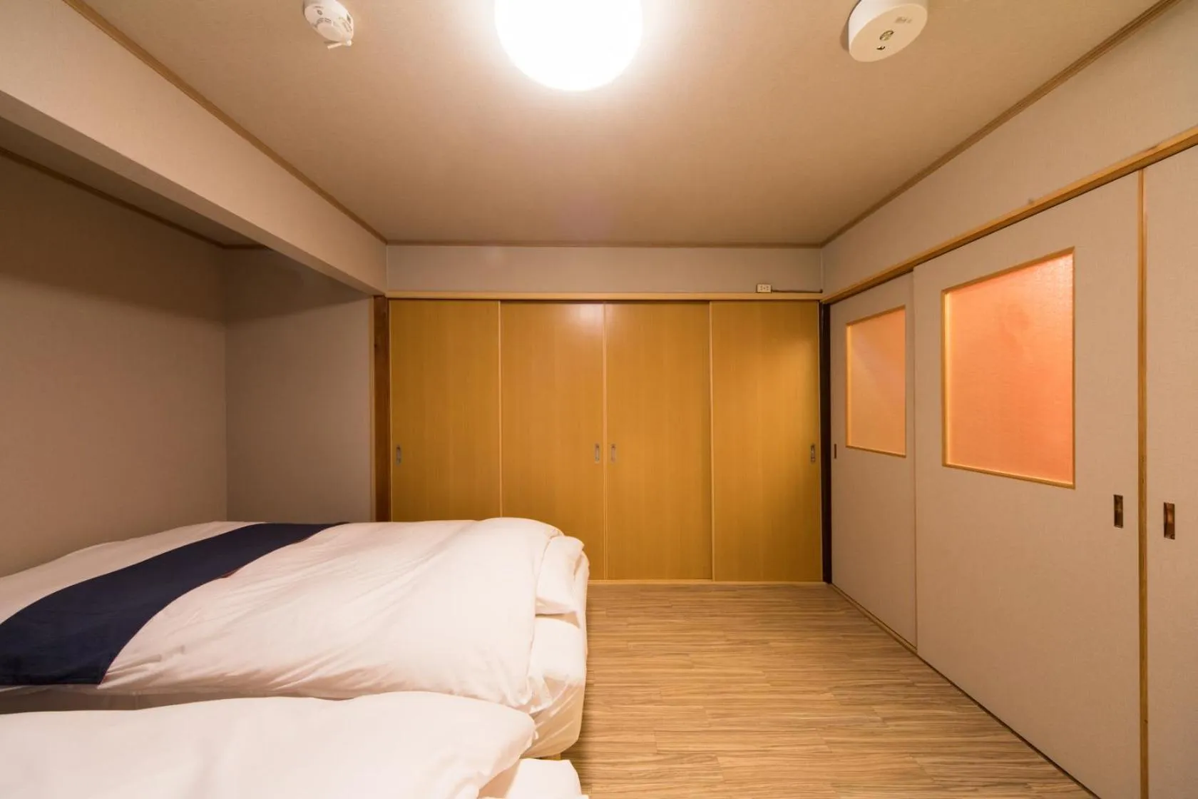 Bed in 京町家 懿造 -Kyomachiya IZO-