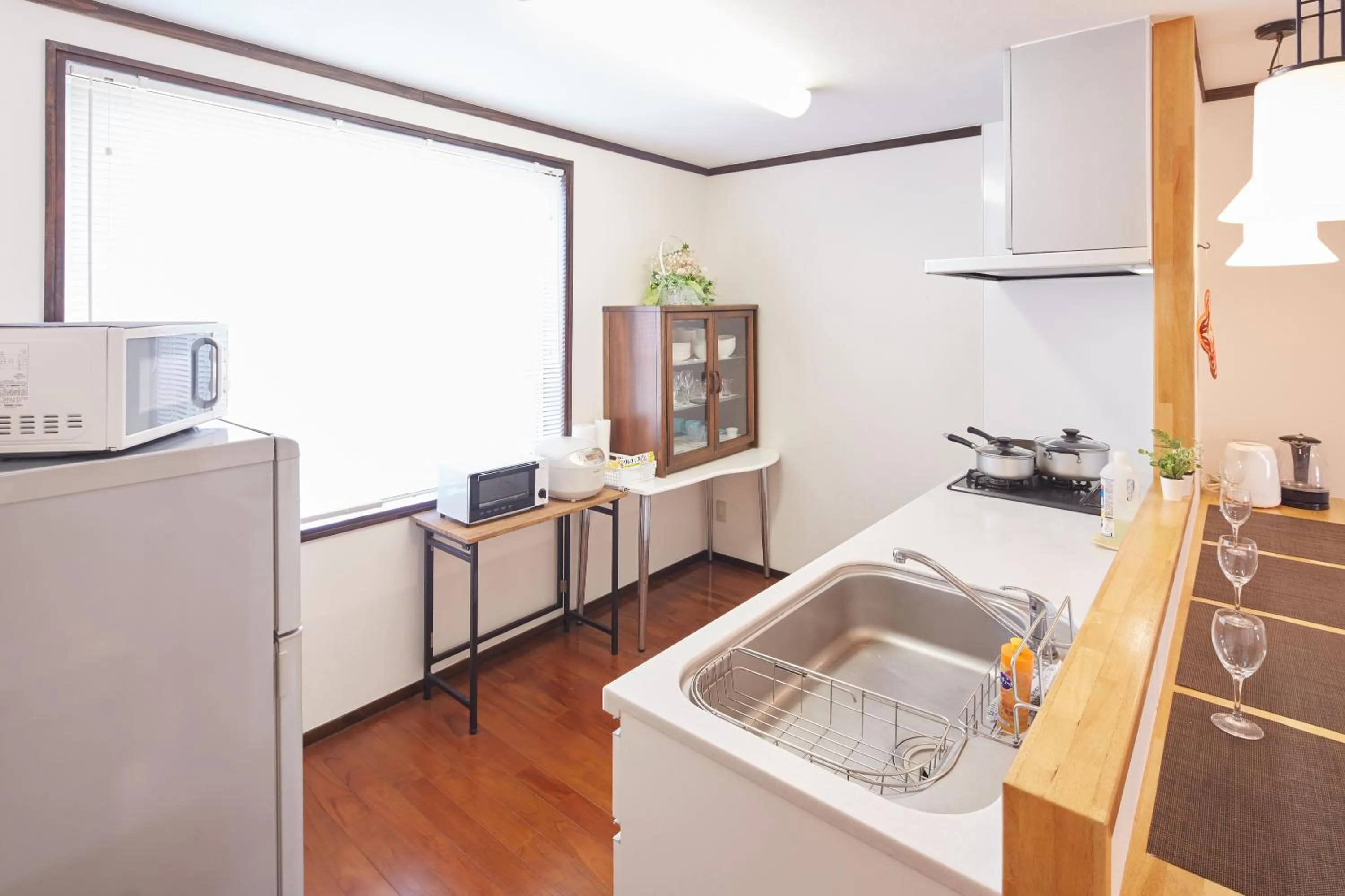 Kitchen or kitchenette in Wind Makiminato