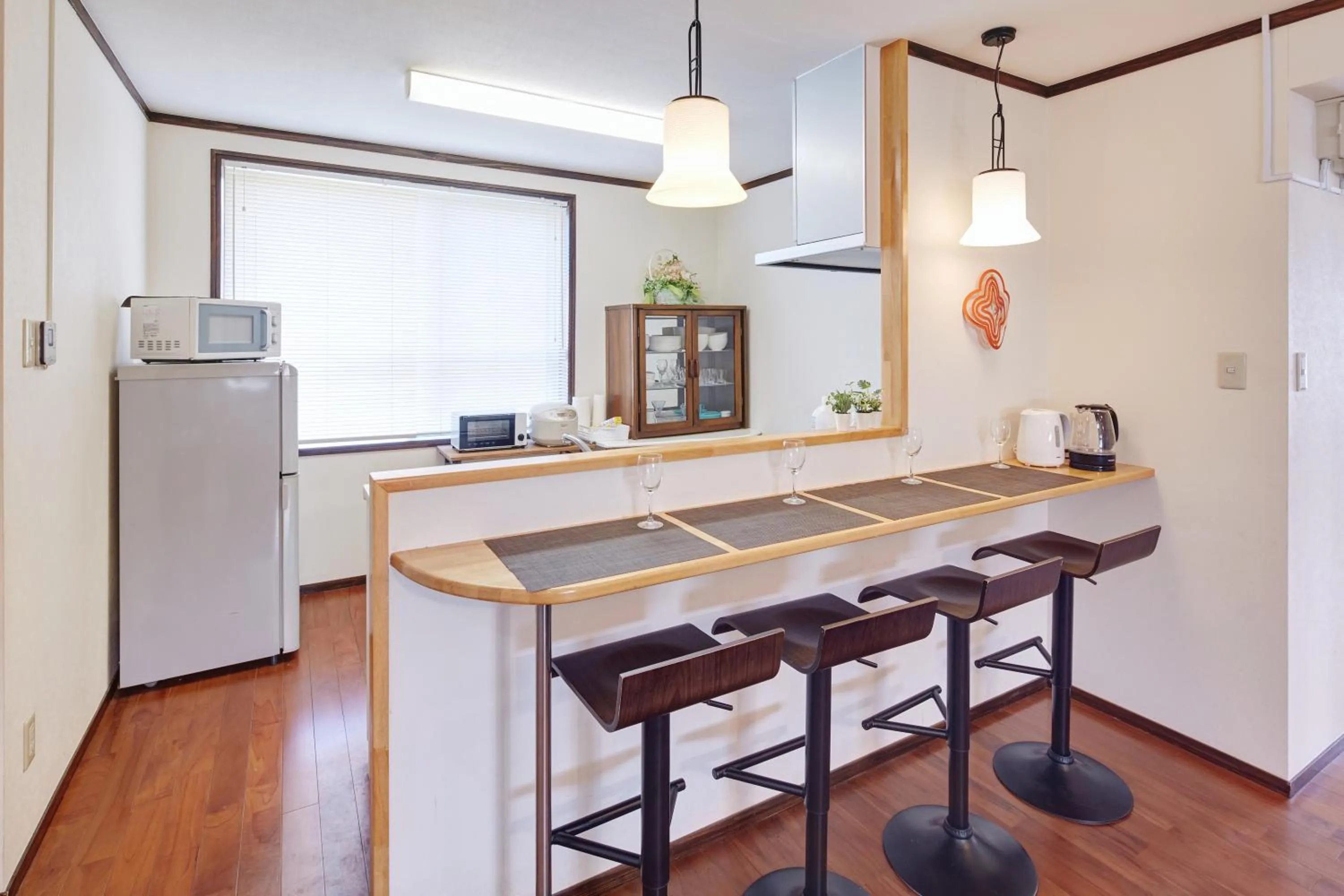 Kitchen or kitchenette in Wind Makiminato
