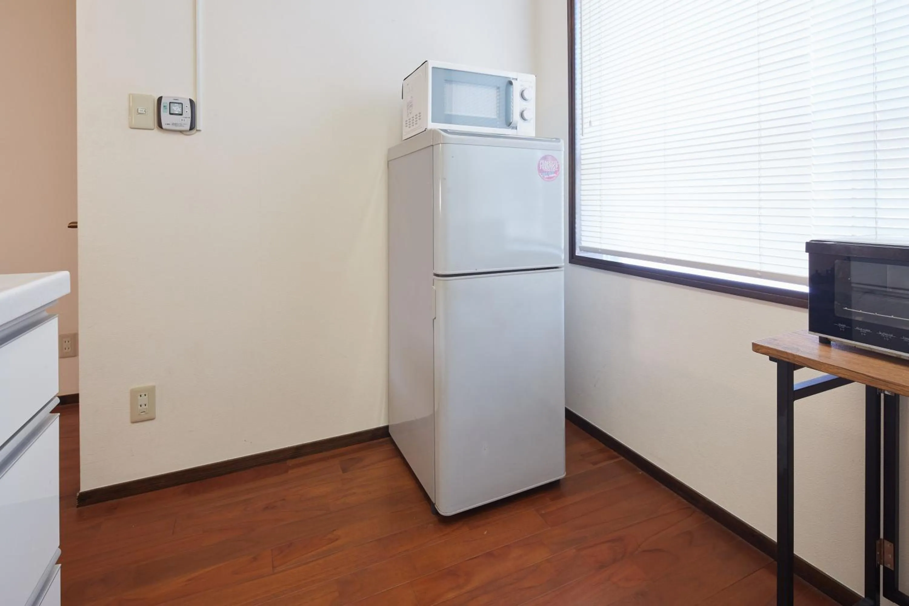 Kitchen or kitchenette in Wind Makiminato