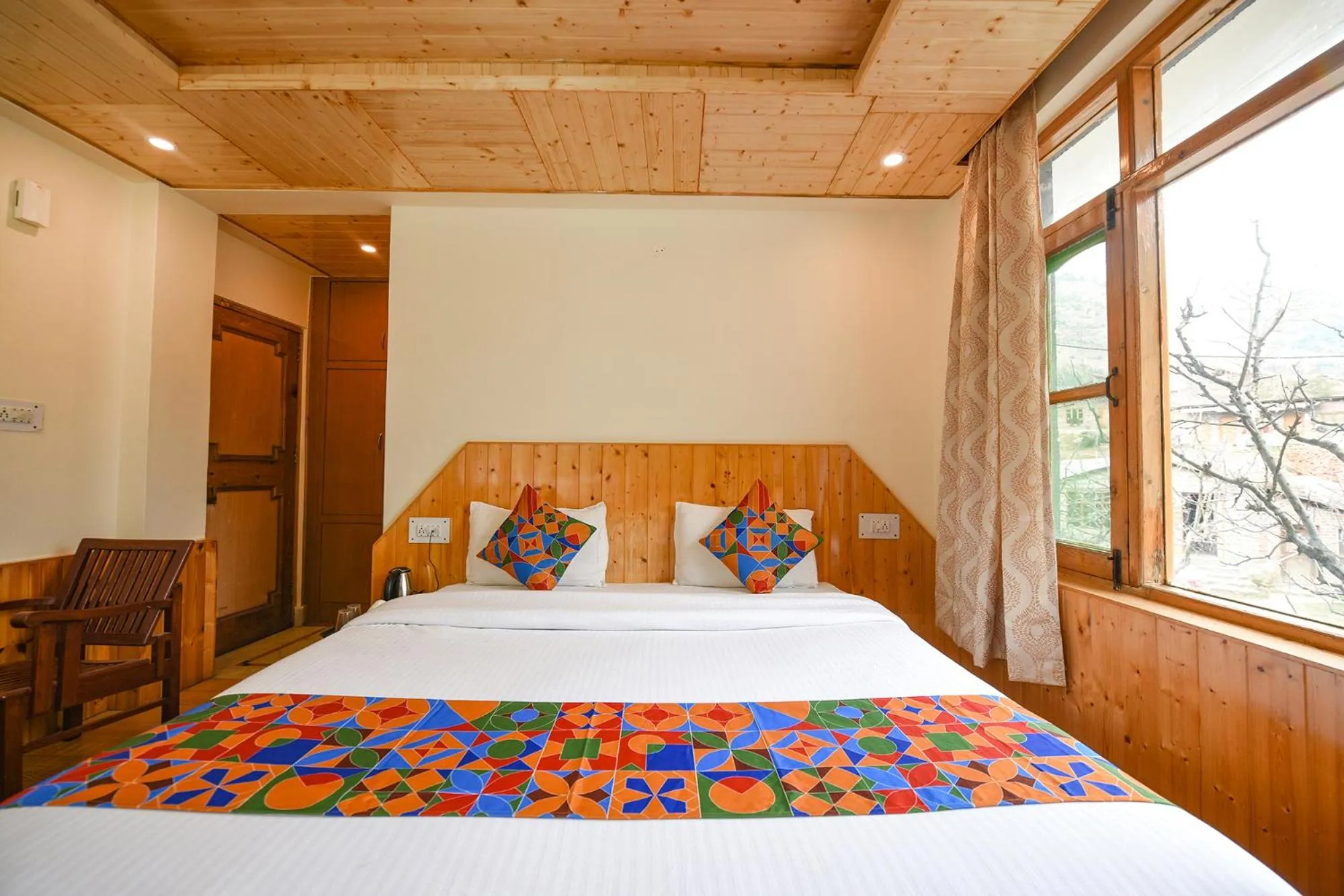 Bed in FabHotel Misty Hills Nehru Kund