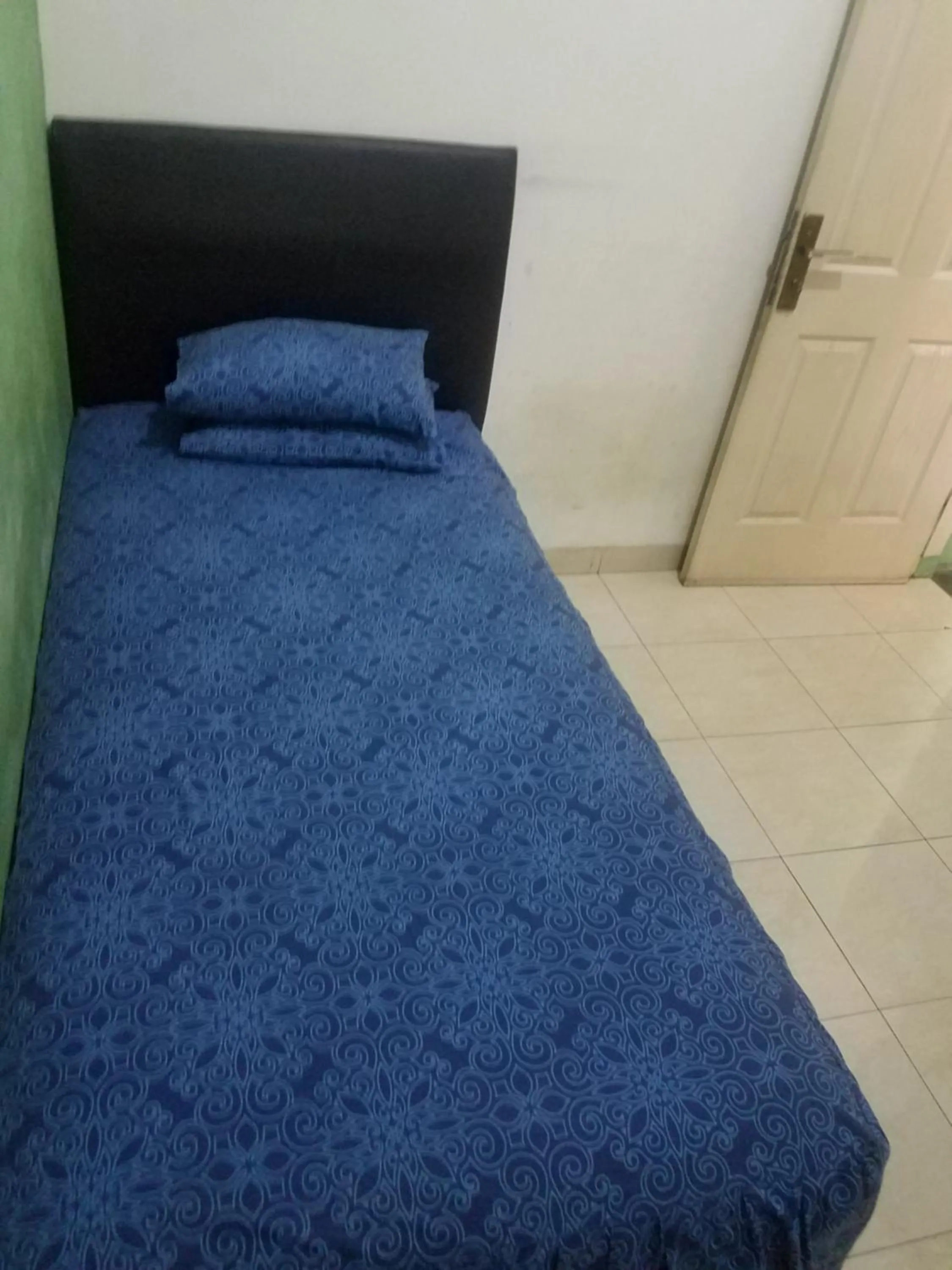 Bed in Cendrawasih Syariah Homestay