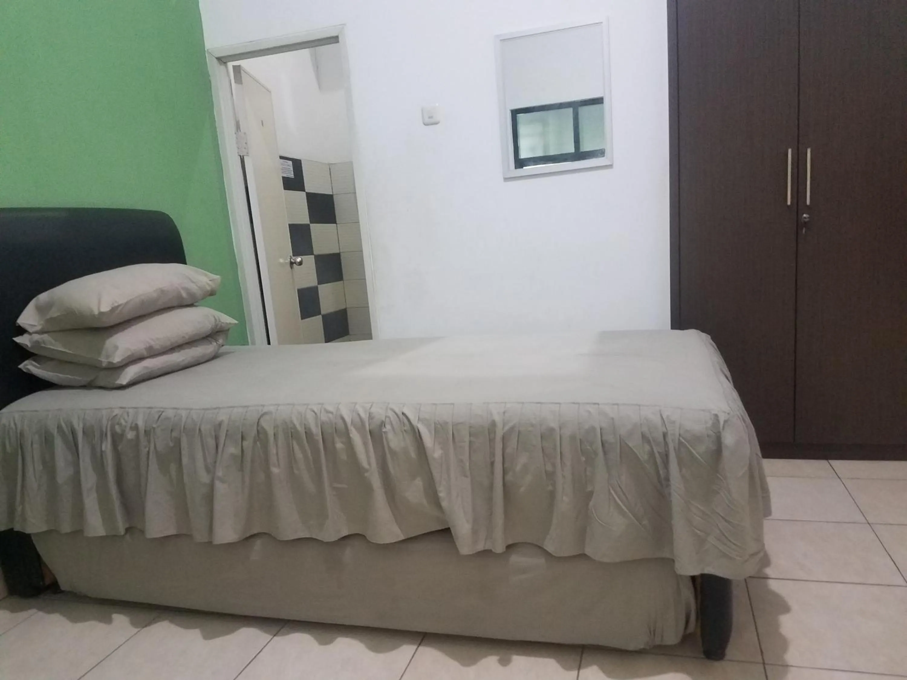 Bed in Cendrawasih Syariah Homestay