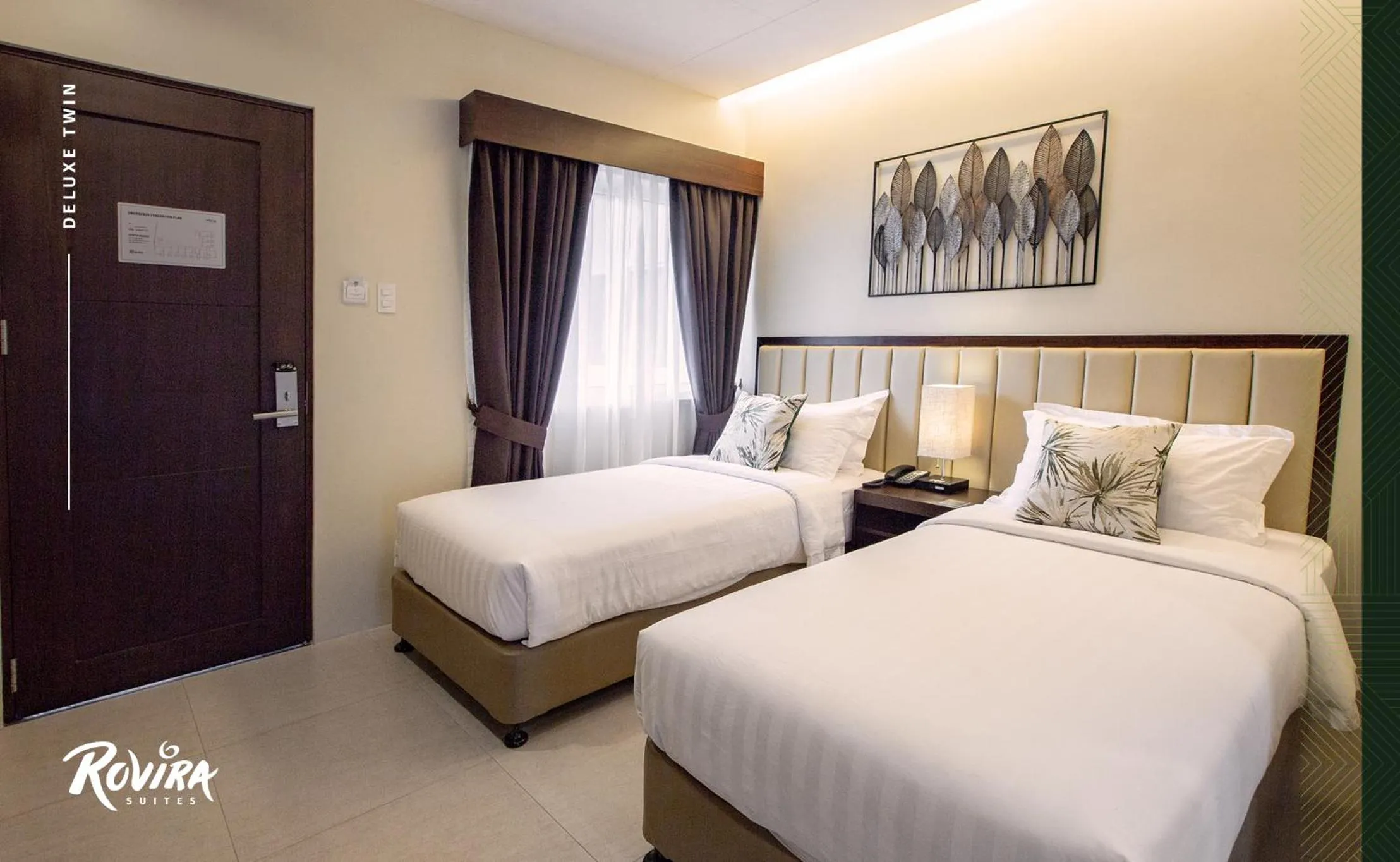 Bed in Rovira Suites
