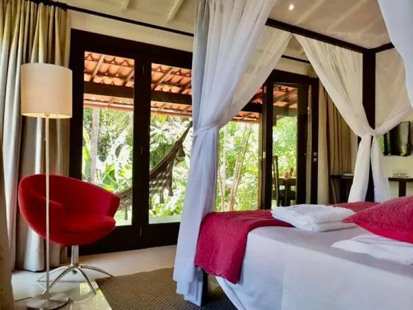 Seating area, Bed in Mangueira Boutique Hotel Moreré