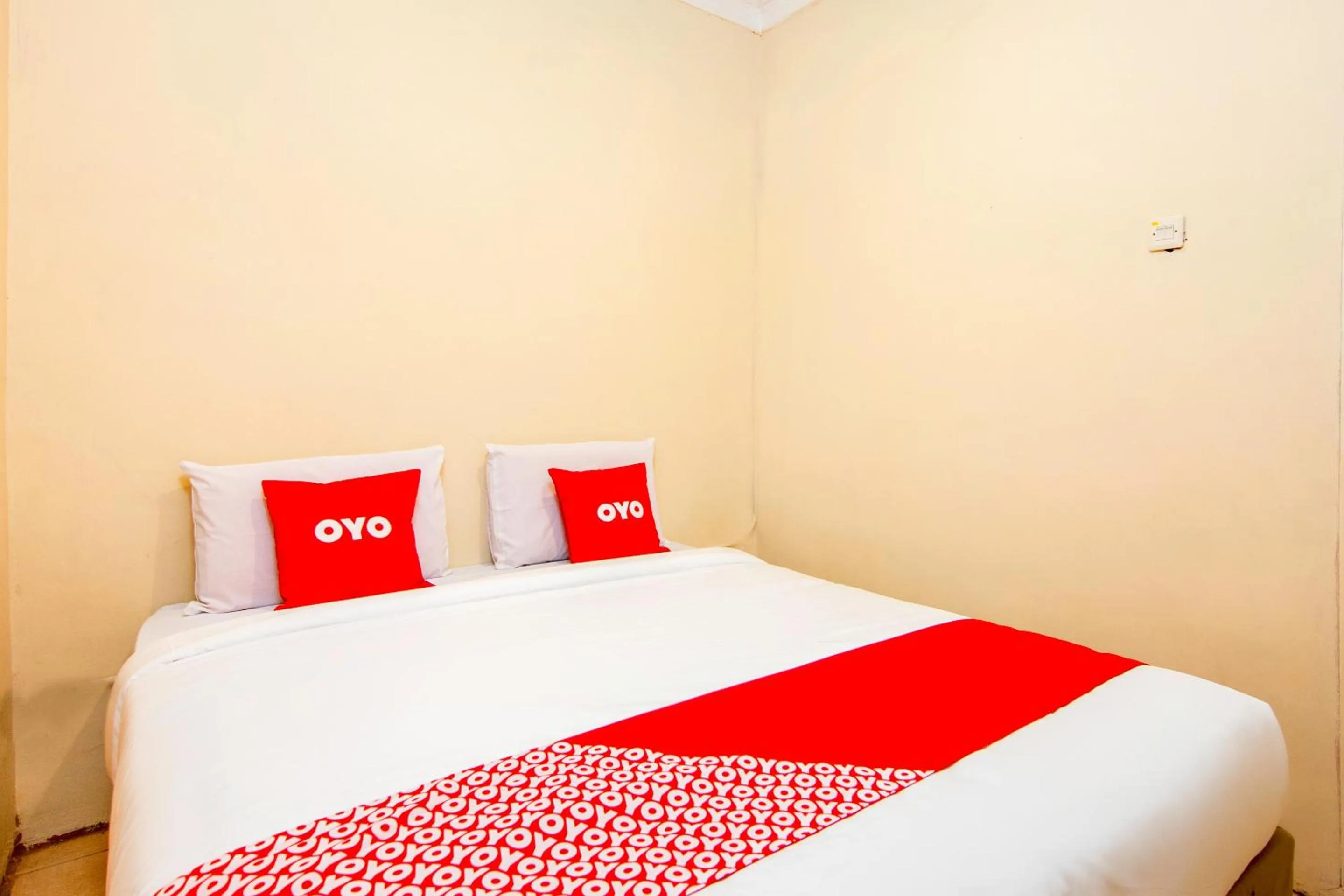 Bedroom in Hotel O 211