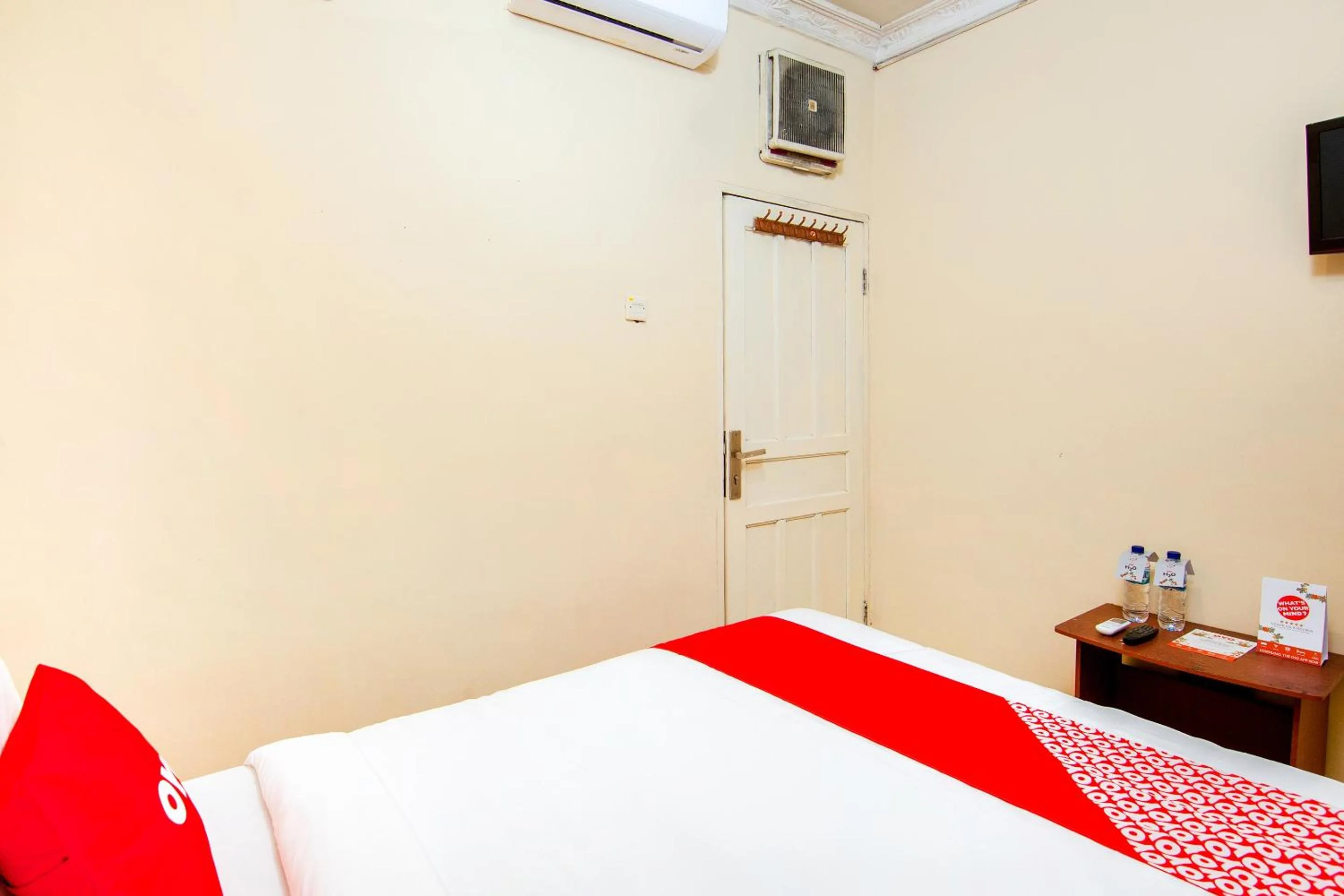 Bedroom in Hotel O 211