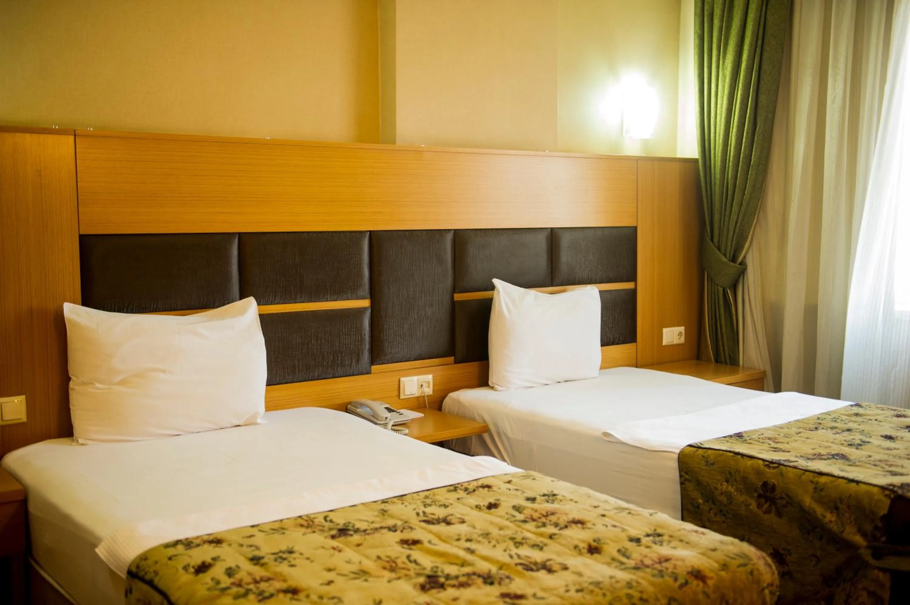 Bed in Polat Elite Hotel