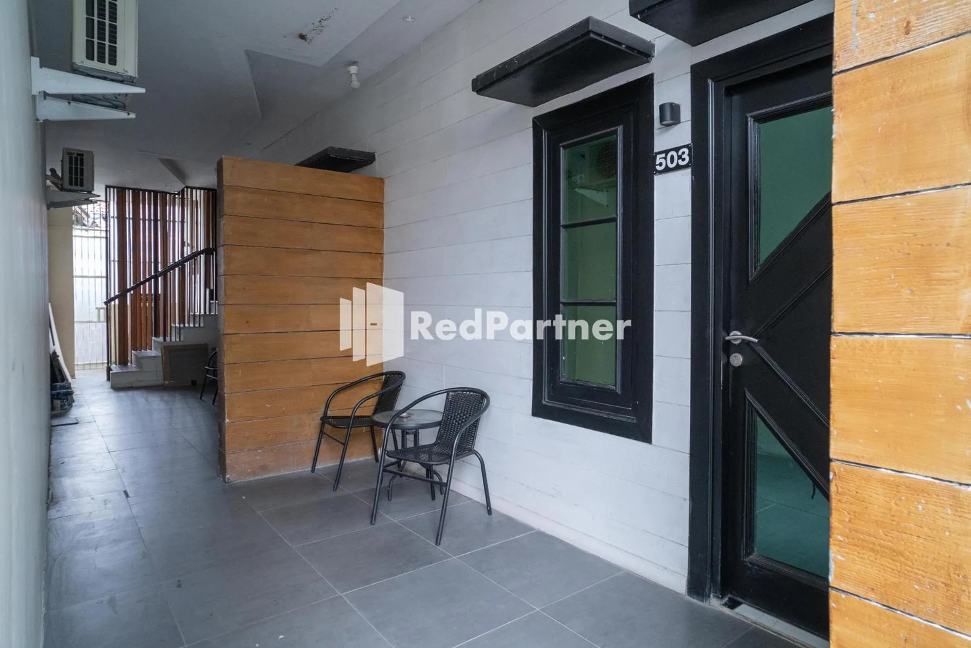 Facade/entrance in Yayah Rooms Bogor Syariah Mitra RedDoorz