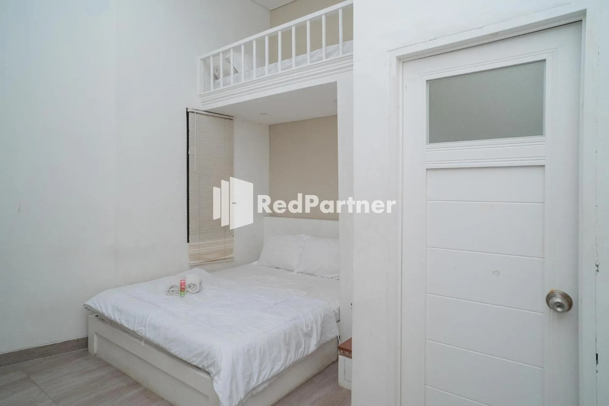 Bed in Yayah Rooms Bogor Syariah Mitra RedDoorz