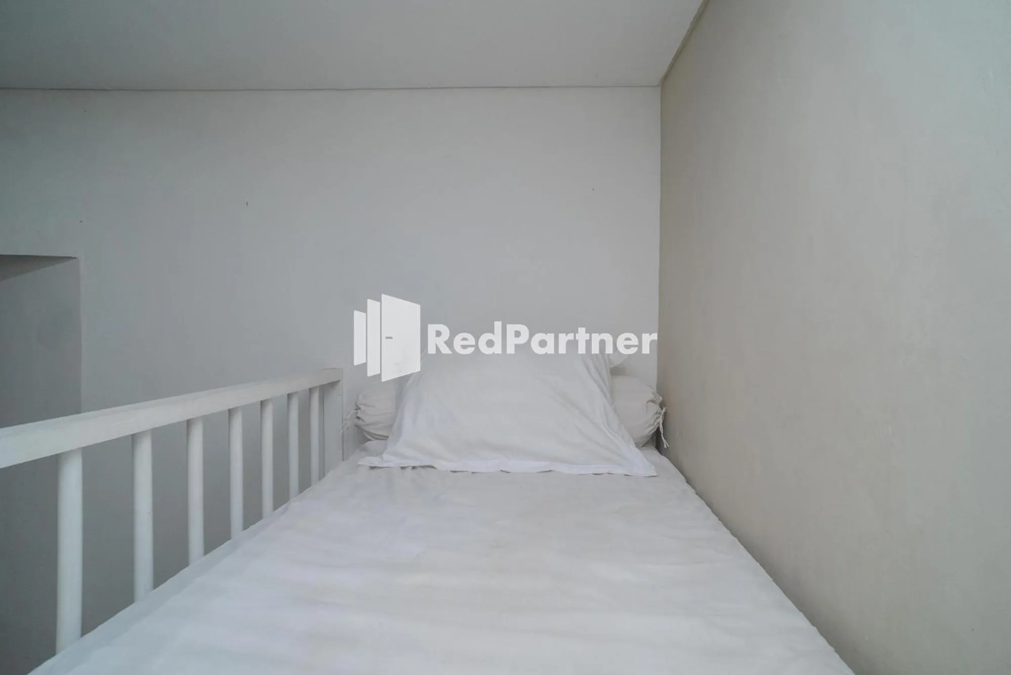 Bed in Yayah Rooms Bogor Syariah Mitra RedDoorz