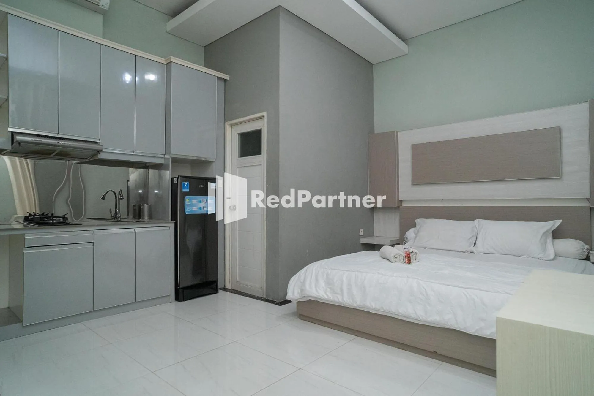 Bed in Yayah Rooms Bogor Syariah Mitra RedDoorz