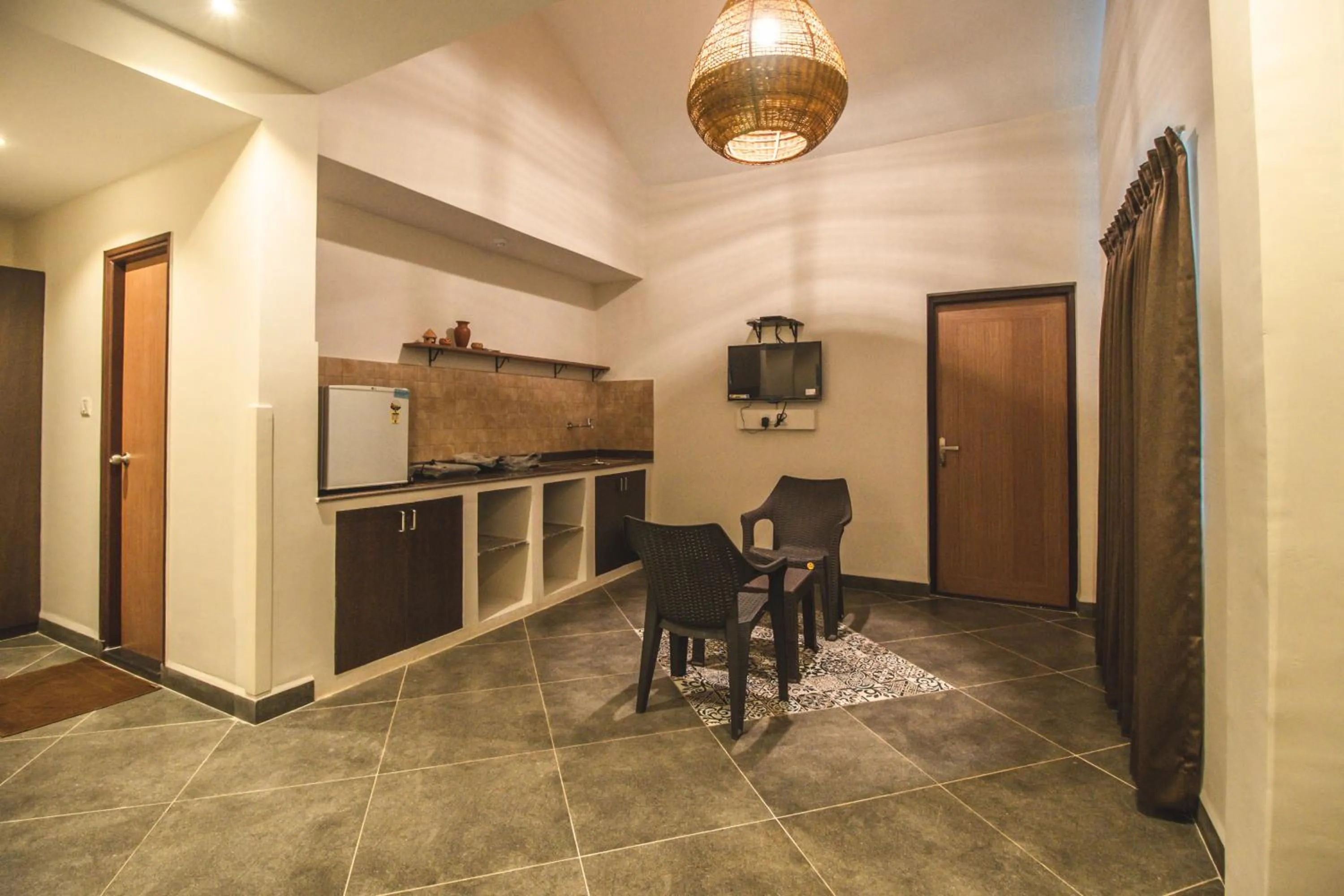 Kitchen or kitchenette in Amber Rooms