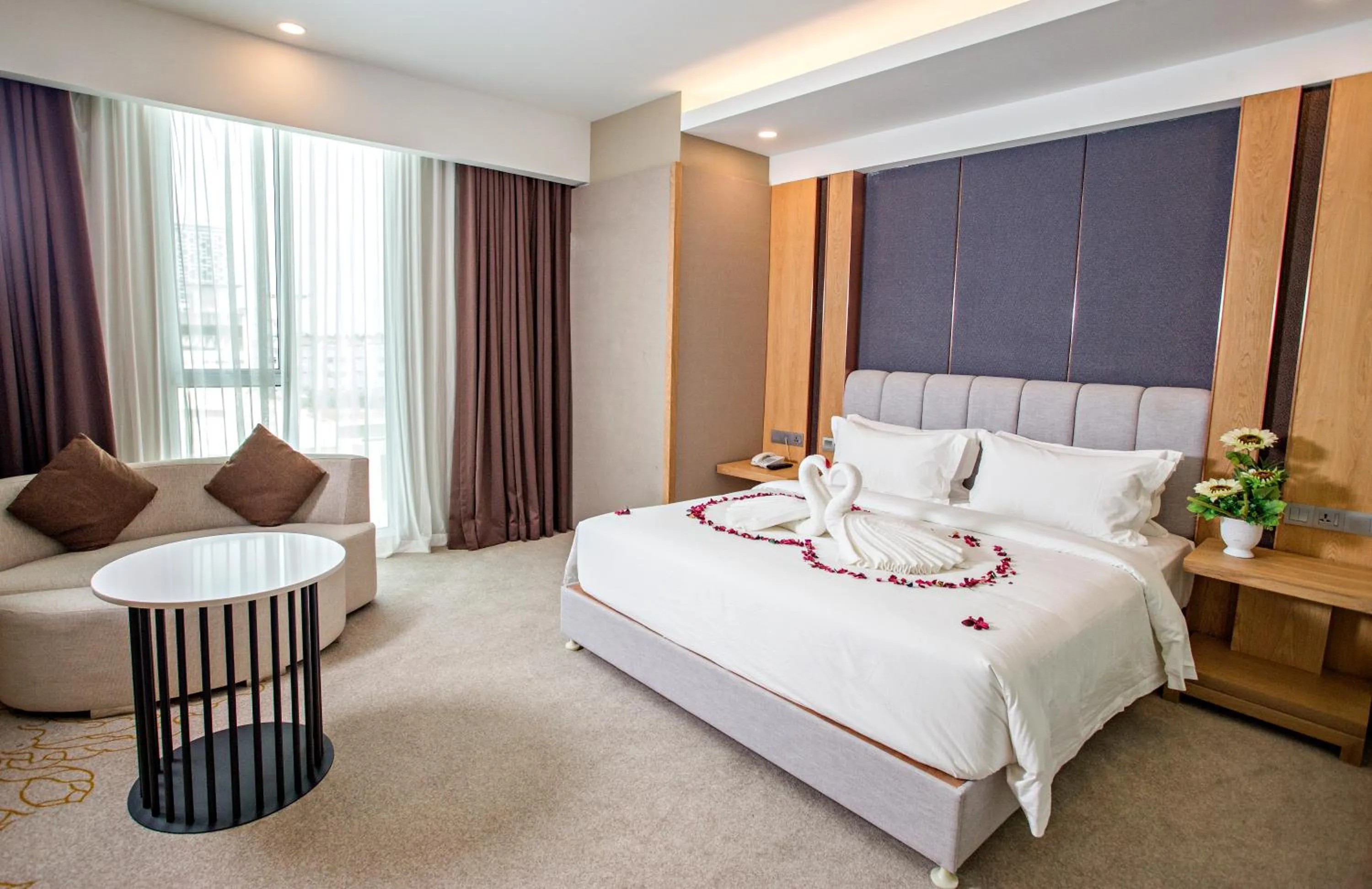 Photo of the whole room, Bed in GRAND FLORA HOTEL