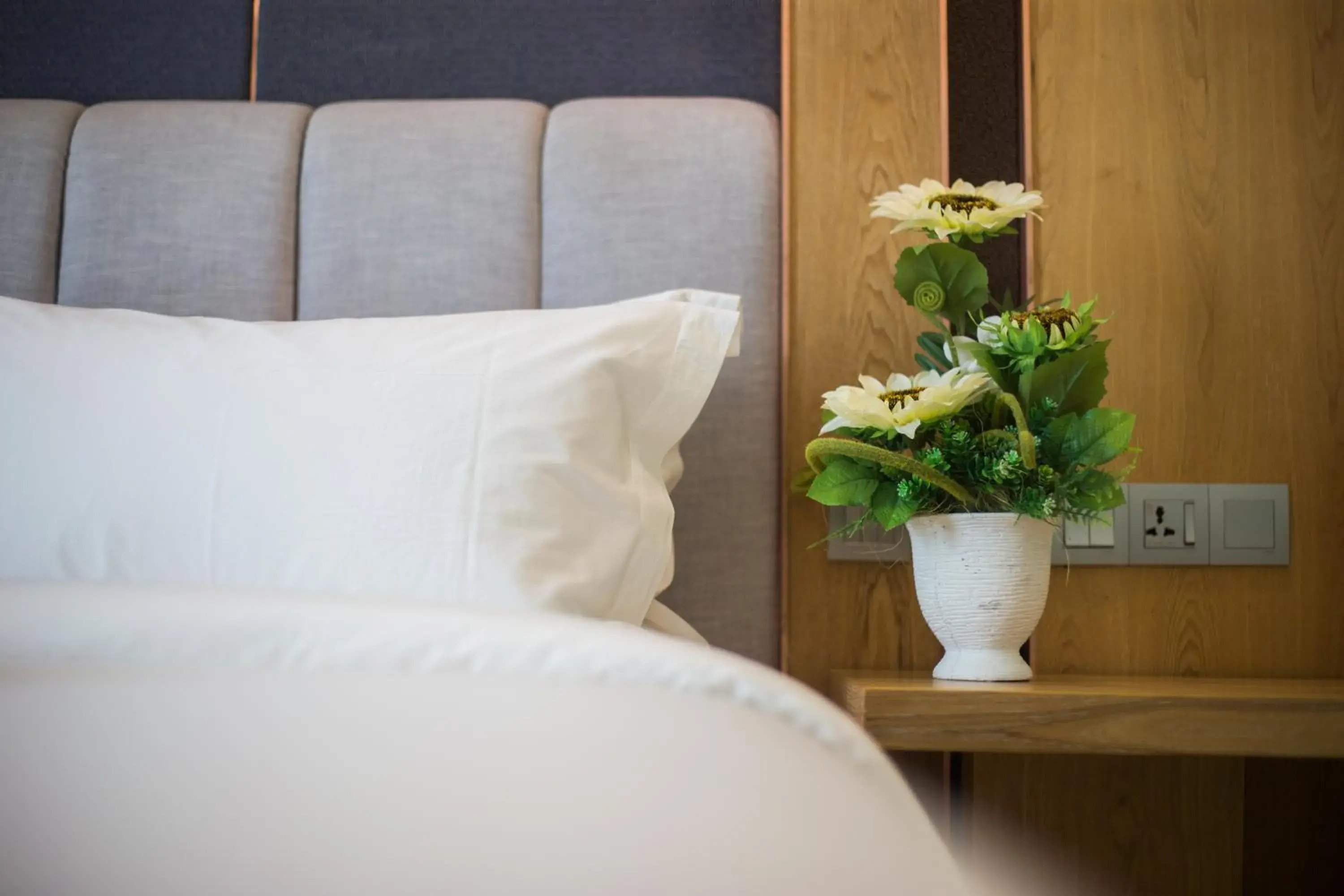 Bed in GRAND FLORA HOTEL Bed in GRAND FLORA HOTEL