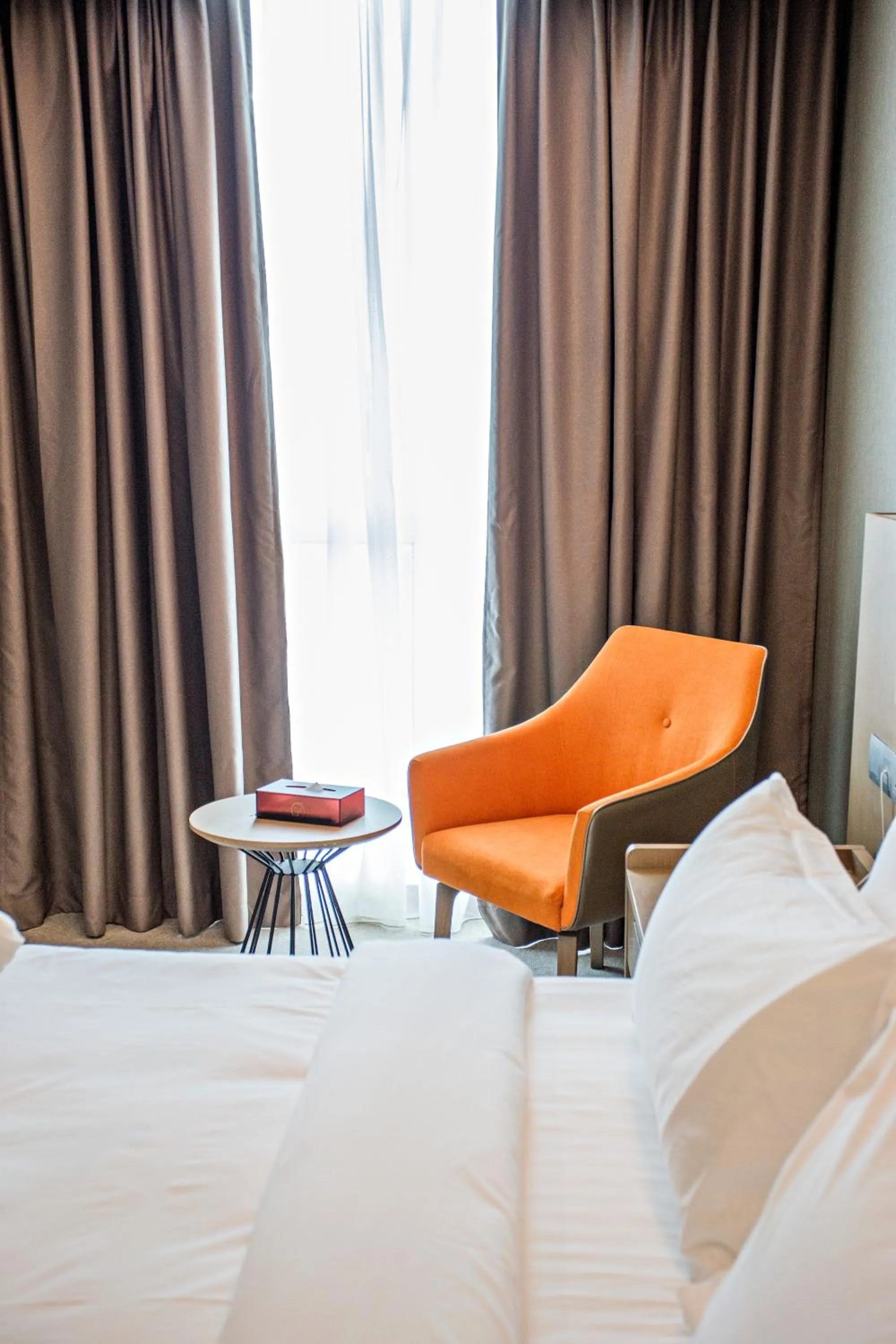 Bed in GRAND FLORA HOTEL