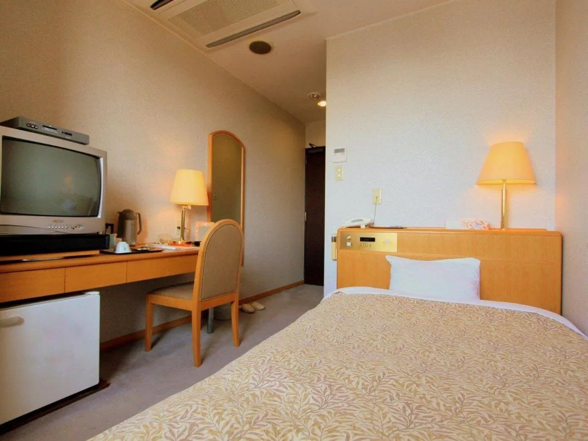 Bed in Hotel Symphony Sagae Onsen