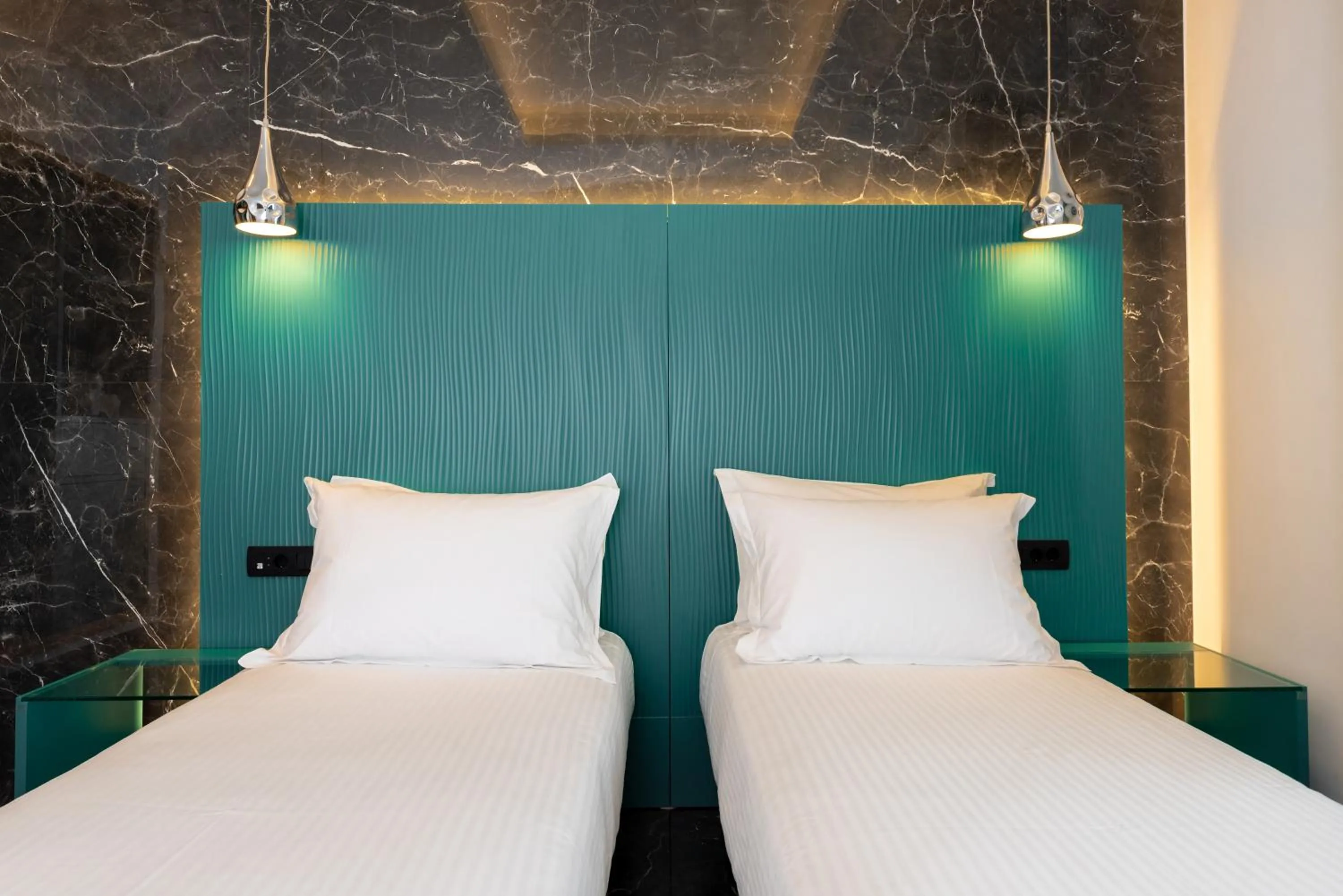 Bed in Deluxe Suites Santorini