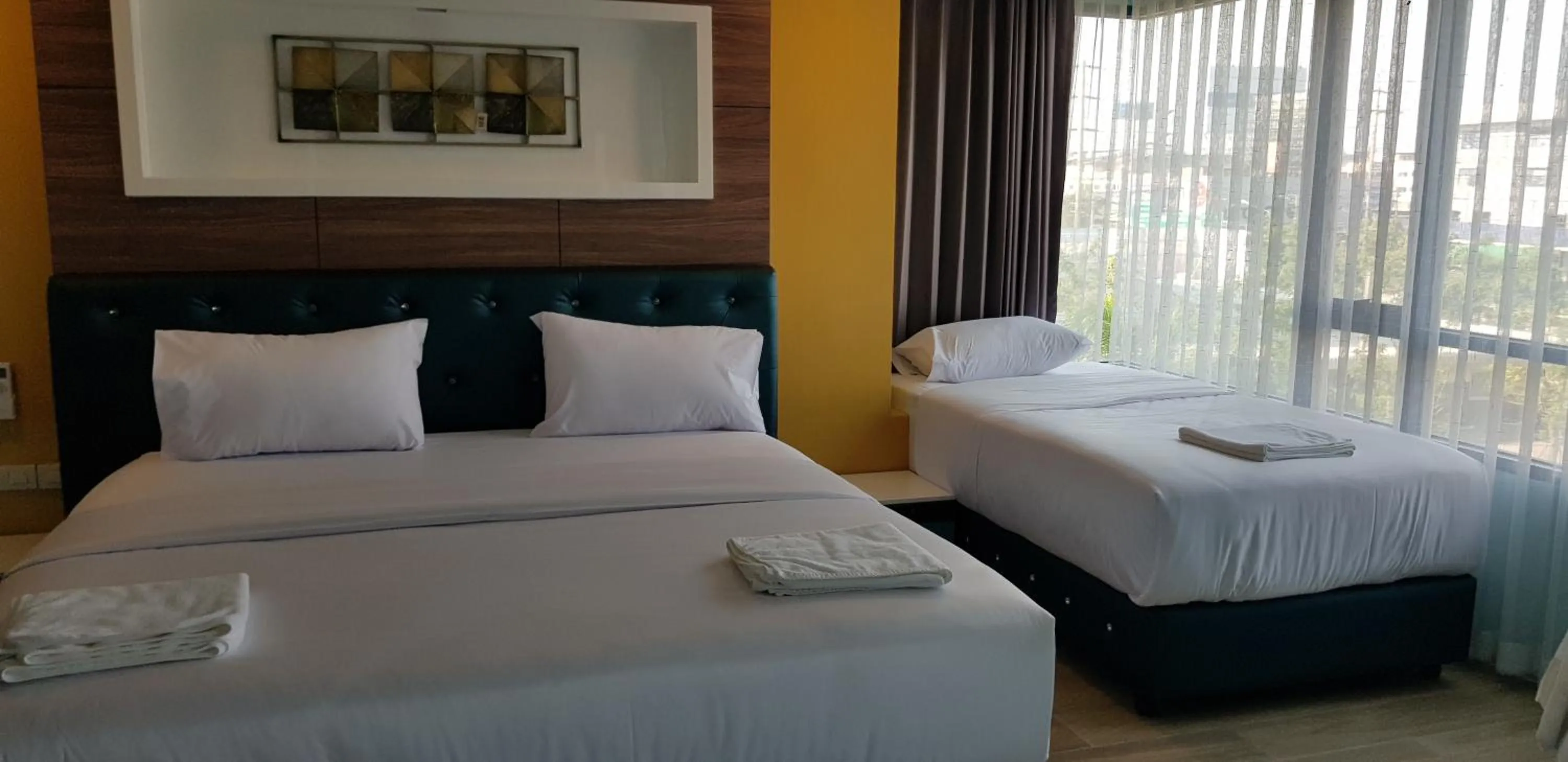 Bed in BlueTel Re'sidencE Bangkok IMPACT บลูเทล เรซิดองส์ กรุงเทพ อิมแพค