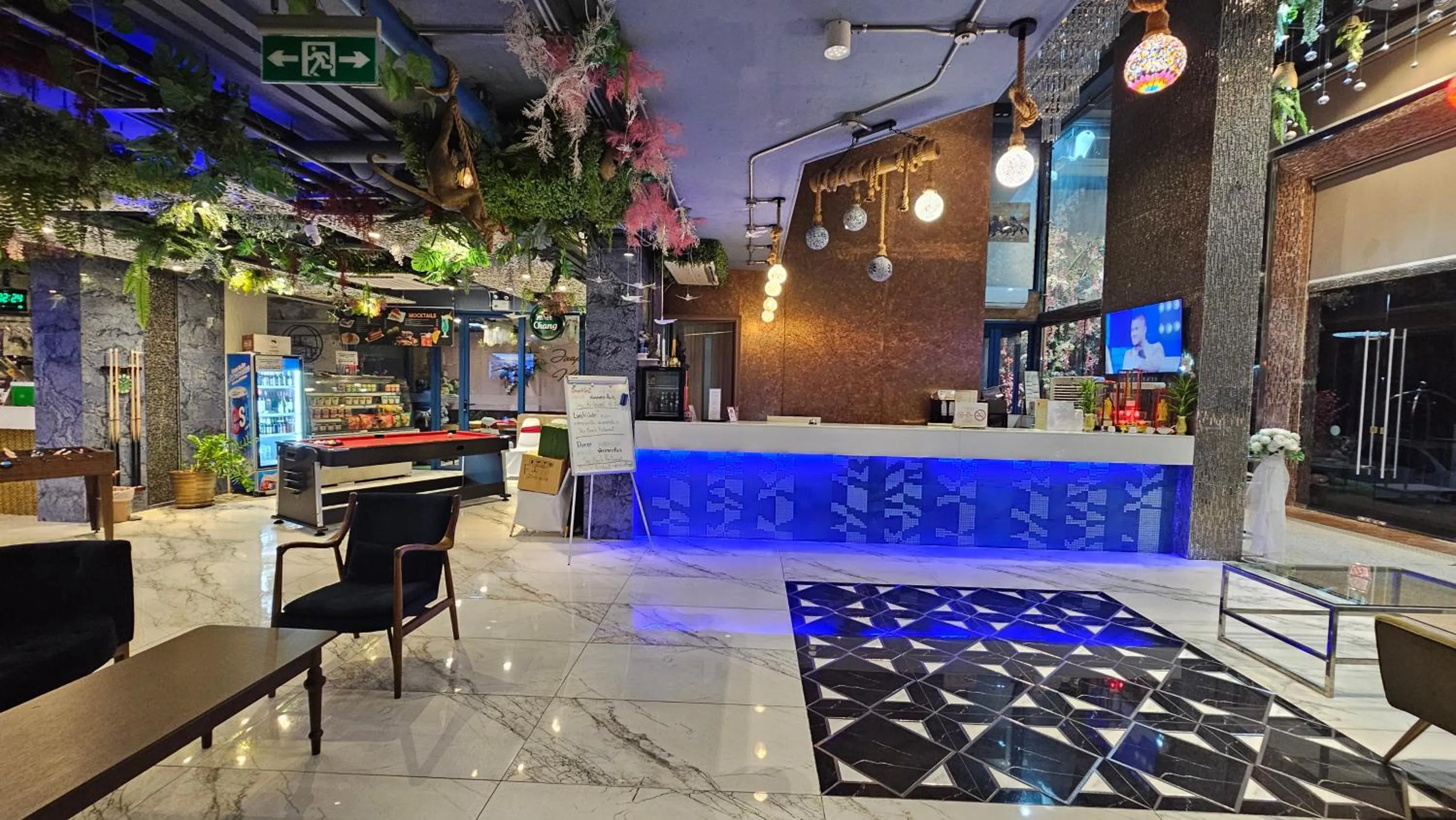 Communal lounge/ TV room in BlueTel Re'sidencE Bangkok IMPACT บลูเทล เรซิดองส์ กรุงเทพ อิมแพค