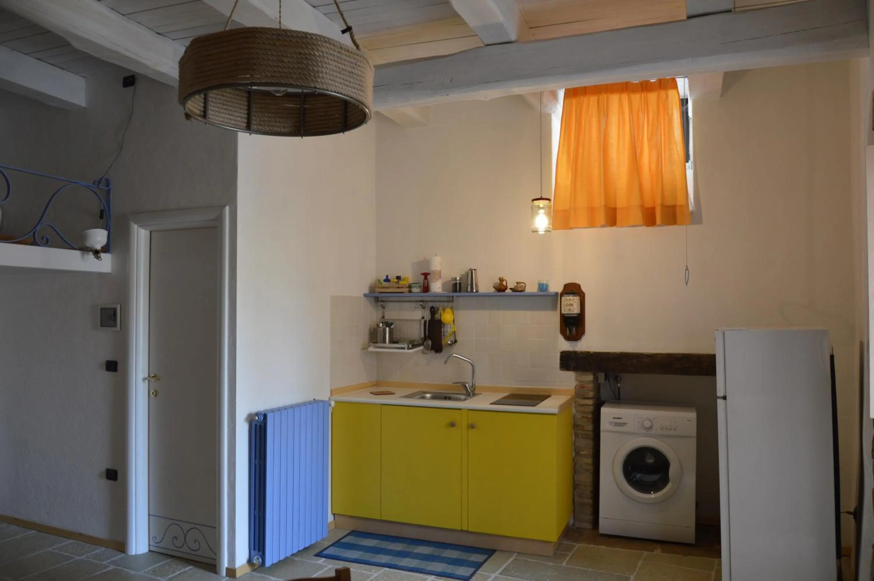 Kitchen or kitchenette in Capovalle B&B