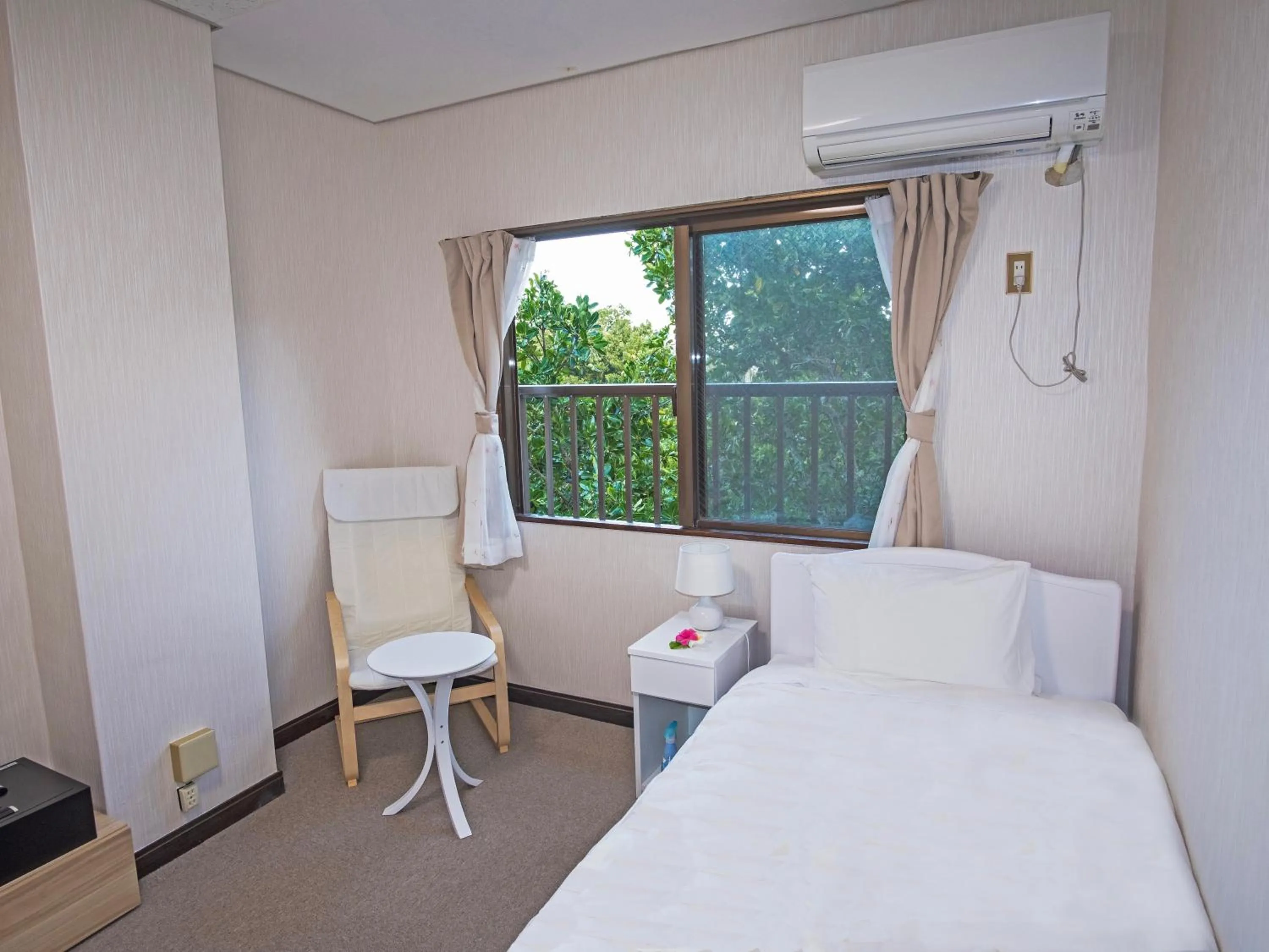 Bed in Hotel Hoshitate Iriomotejima