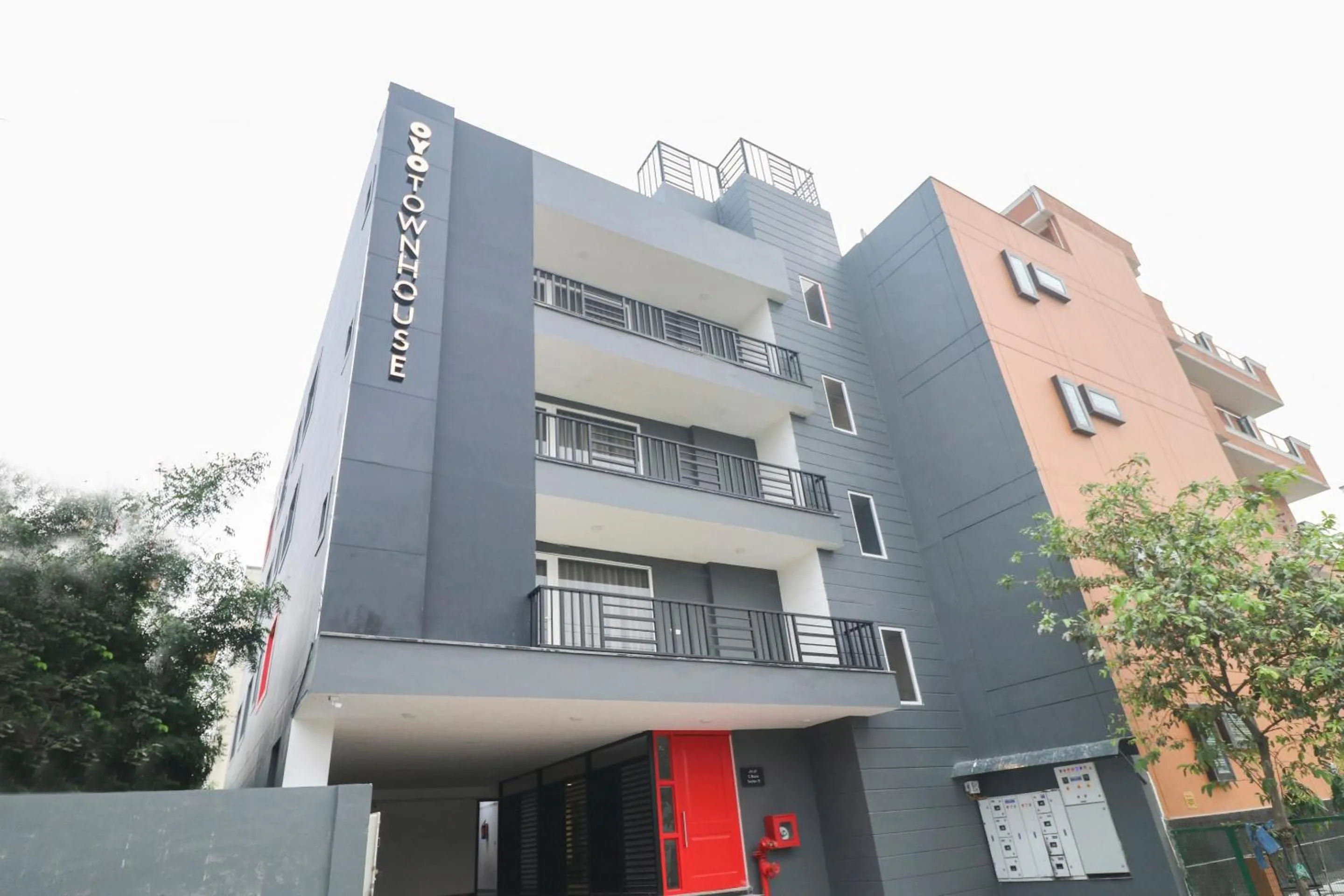 Facade/entrance in Super Townhouse Noida Sector 71 Near ISKCON Temple Noida